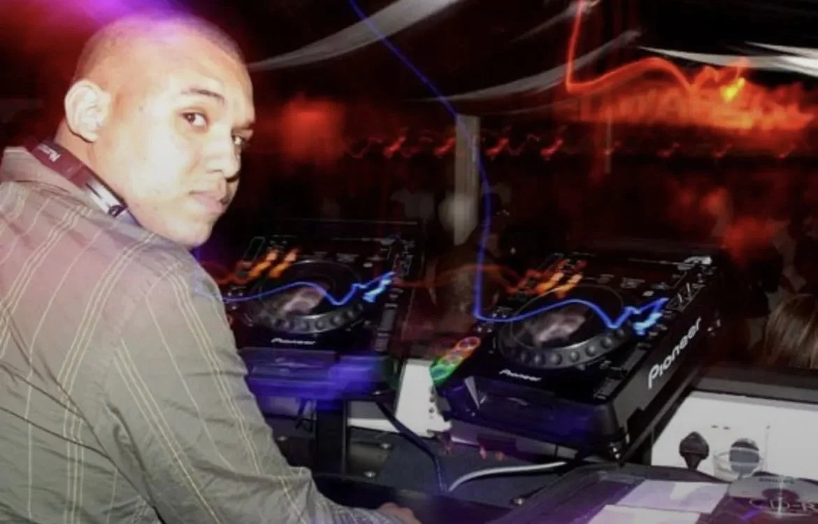 DJ on the decks at a club in Harrogate
