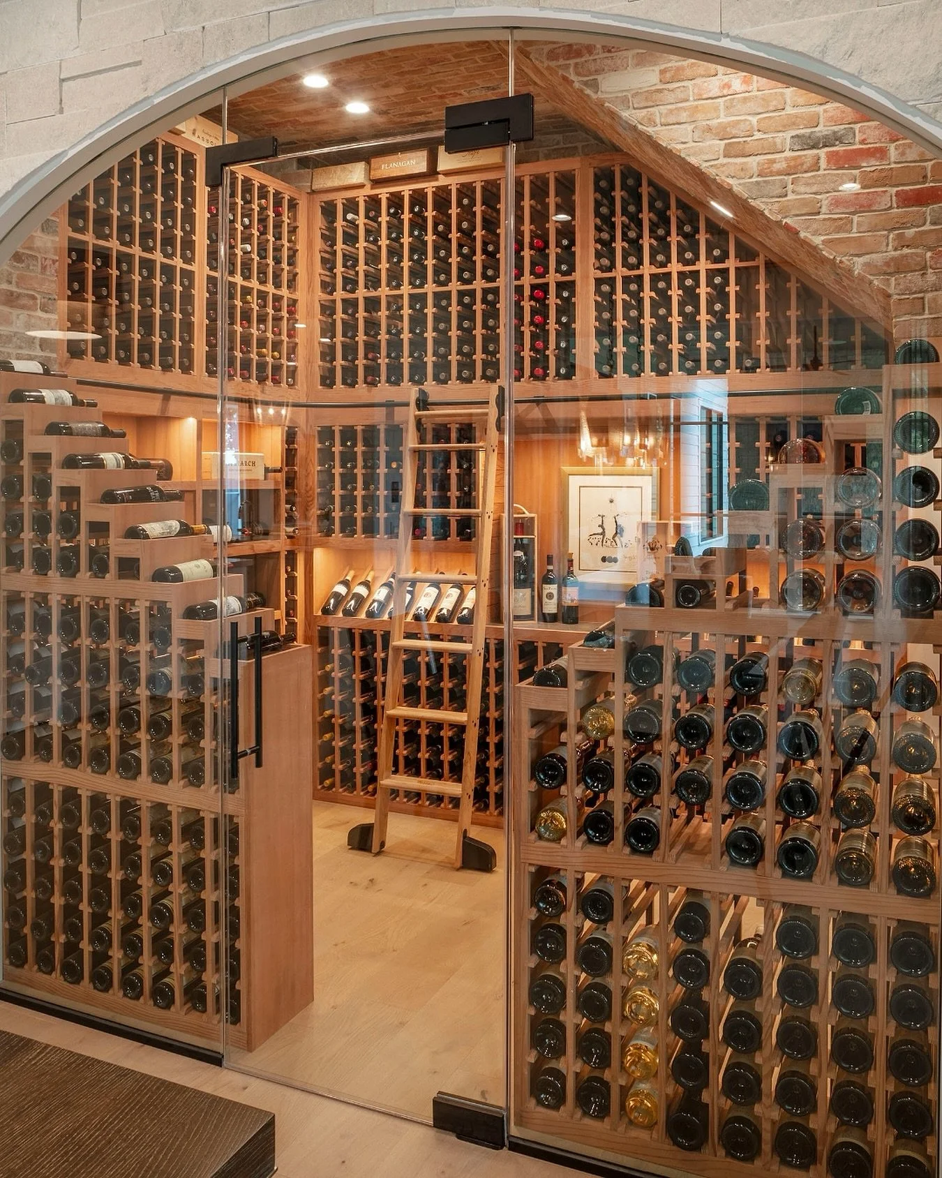 Where timeless craftsmanship meets a perfectly aged pour. 🍷

This custom wine cellar was crafted for the moments that deserve to be savored.
.
.
.
.
.

#luxurycustomhomes #dreamhomebuilders #houstonluxuryhomes #houstonhomebuilder #winecellar
