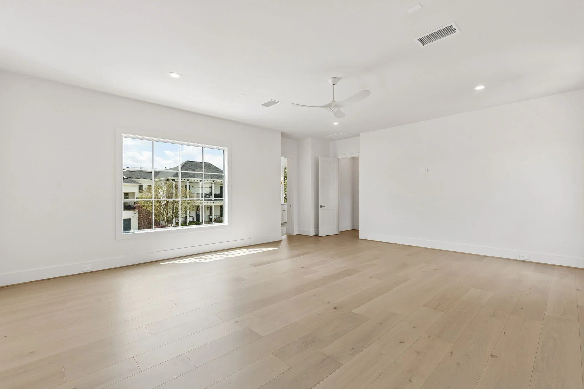 702 E 8th - Primary Bed 2.jpg