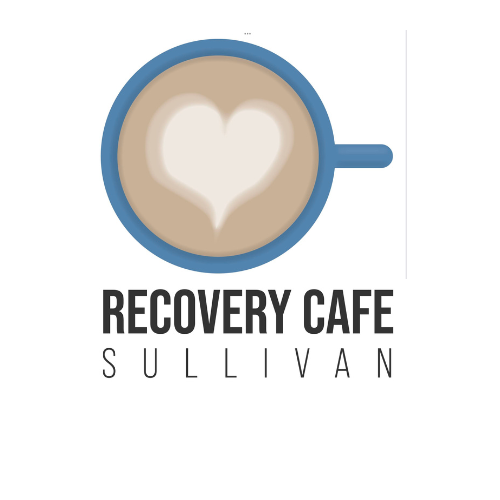 Coffee cup with a heart-shaped latte art and the text 'Recovery Cafe Sullivan' below.