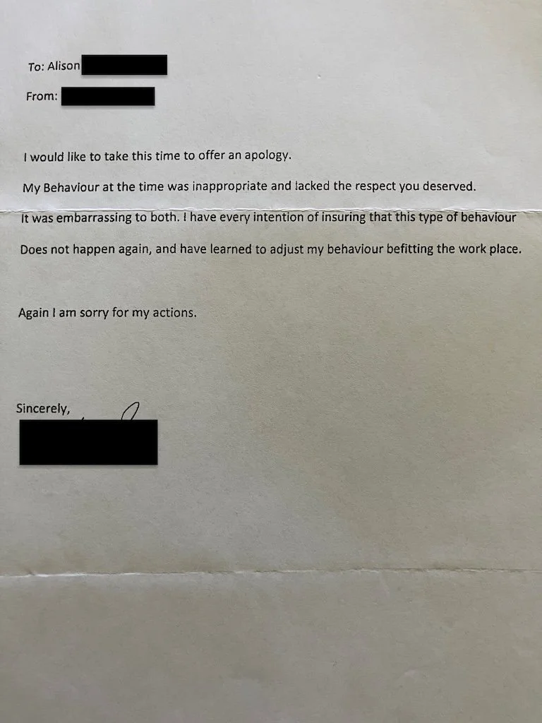 Redacted handwritten apology letter on plain paper from a male former colleague