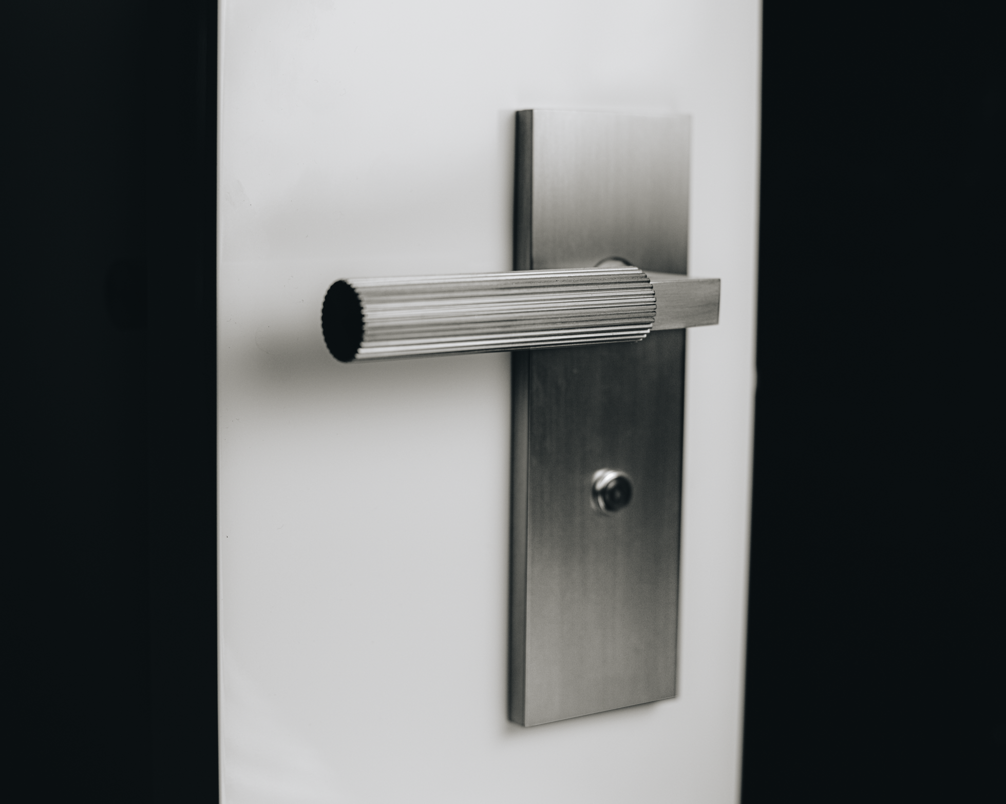Sleek and modern custom hardware in a satin nickel finish high quality made in USA.