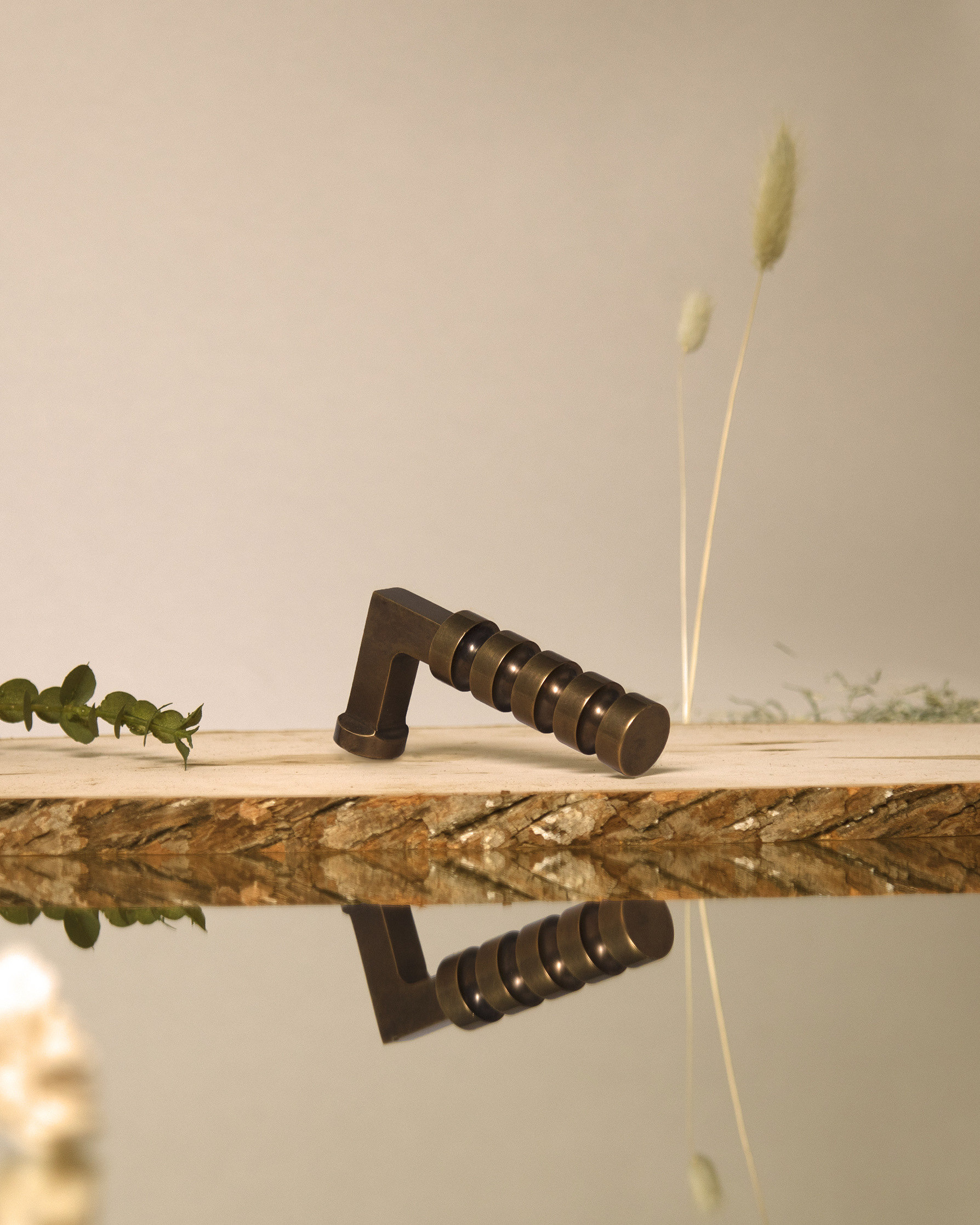 Custom modern lever in a tarnished brass finish designed by Accurate Lock and Hardware in Stamford, CT.