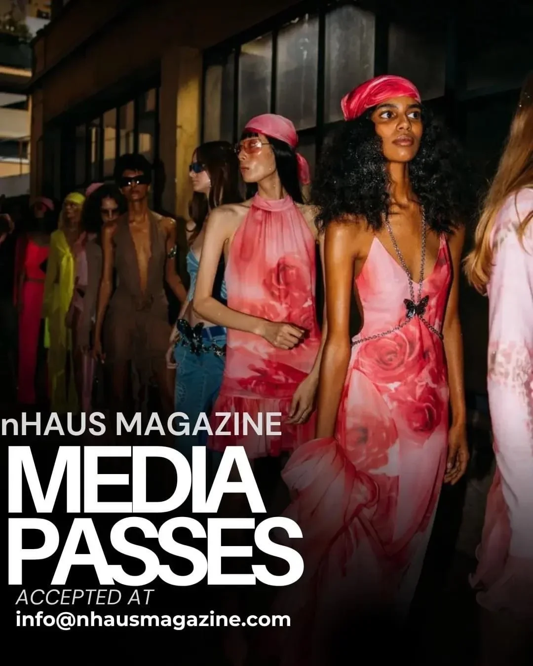 Models in colorful, stylish dresses and accessories walk in a fashion show.