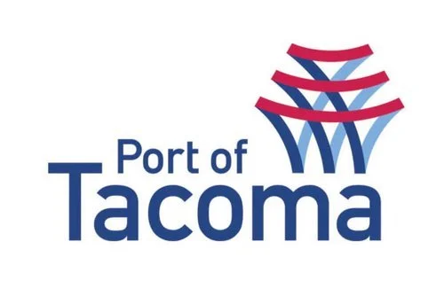Port of Tacoma logo with stylized red, navy, and light blue lines resembling containers or a port crane.