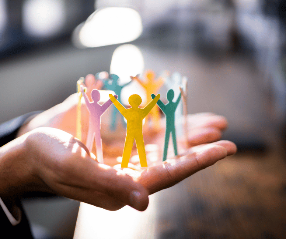 Persone stilizzate colorate che si tengono per mano a formare un cerchio, concetto di team di lavoro e collaborazione