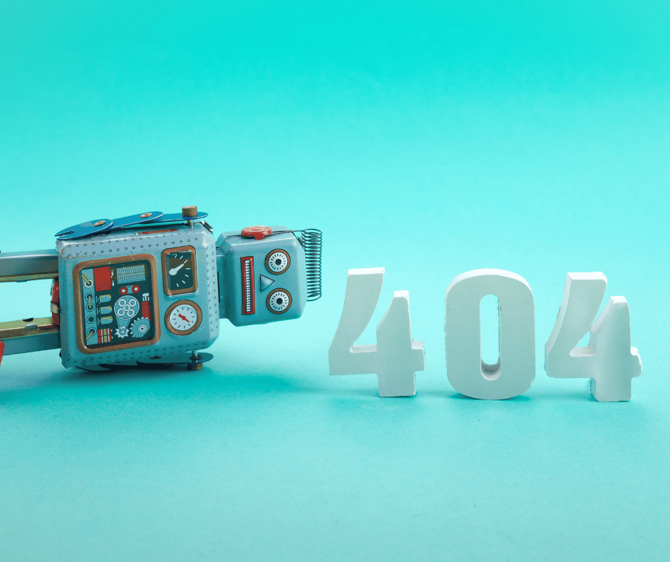 Robot giocattolo accanto al numero 404 a rappresentare l'errore pagina non trovata