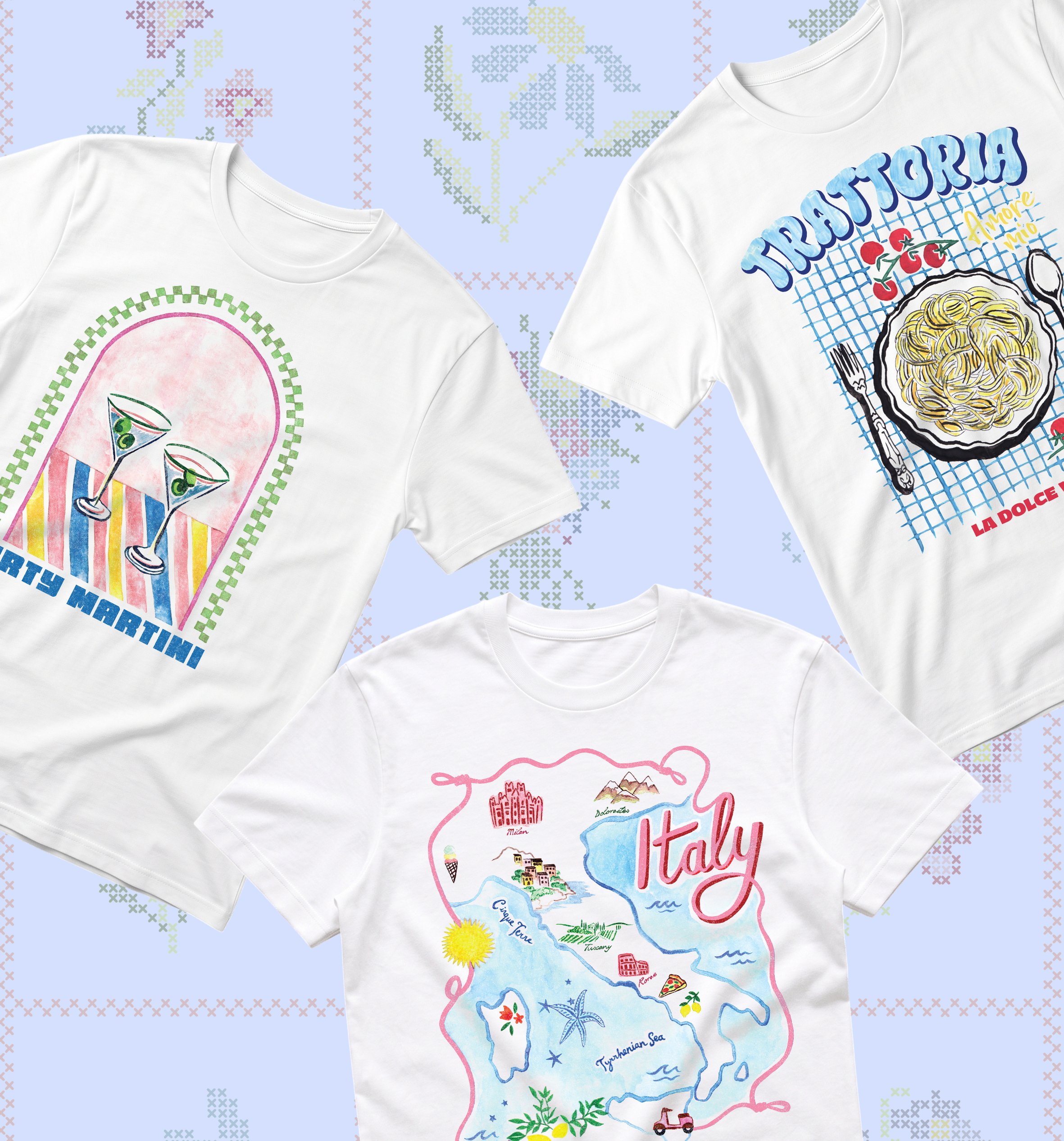 Three white t-shirts with colorful designs of Italy's map and landmarks, laid on a pastel-colored background with pixel art hearts and flowers.