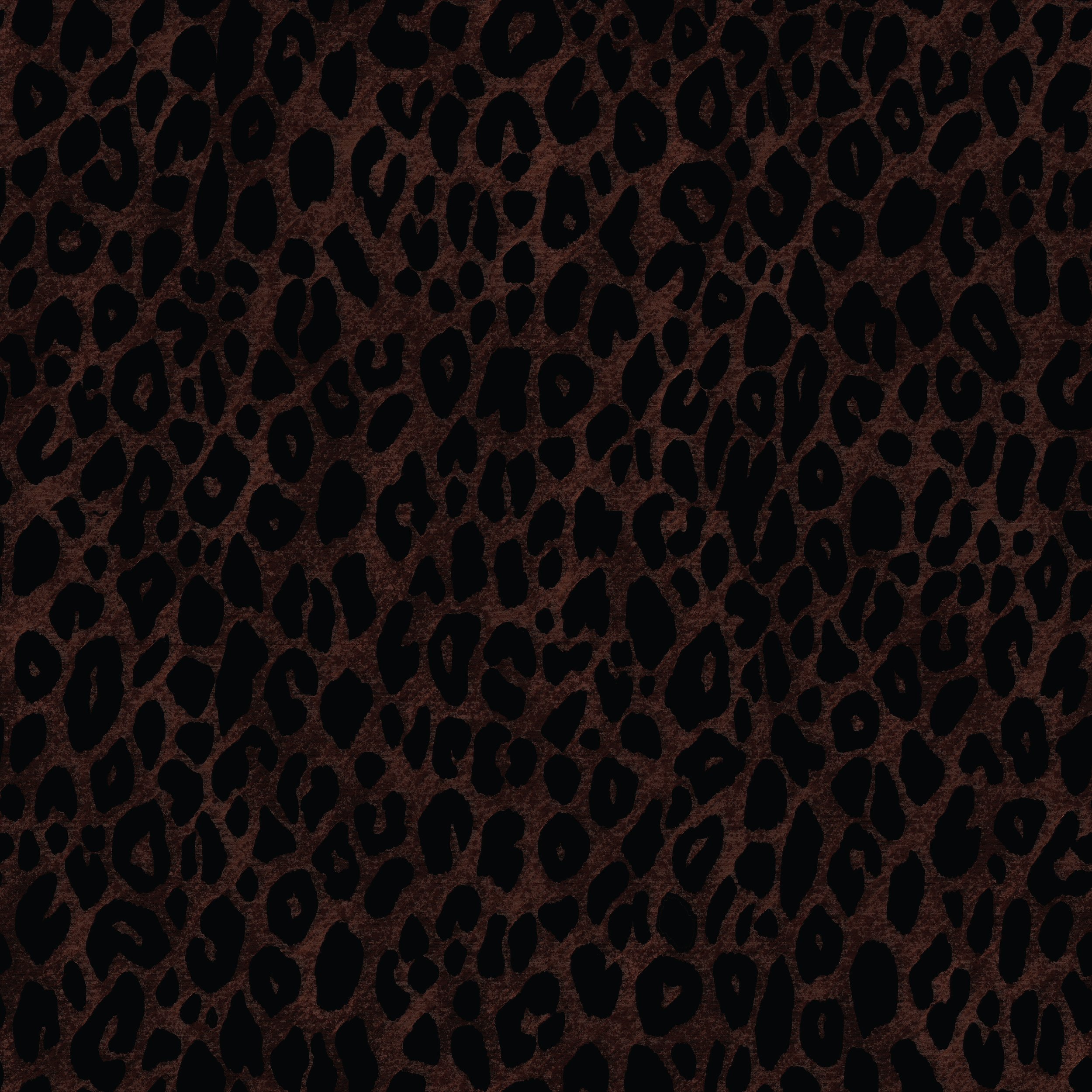 Close-up of animal print pattern resembling leopard spots in black on a brown background.