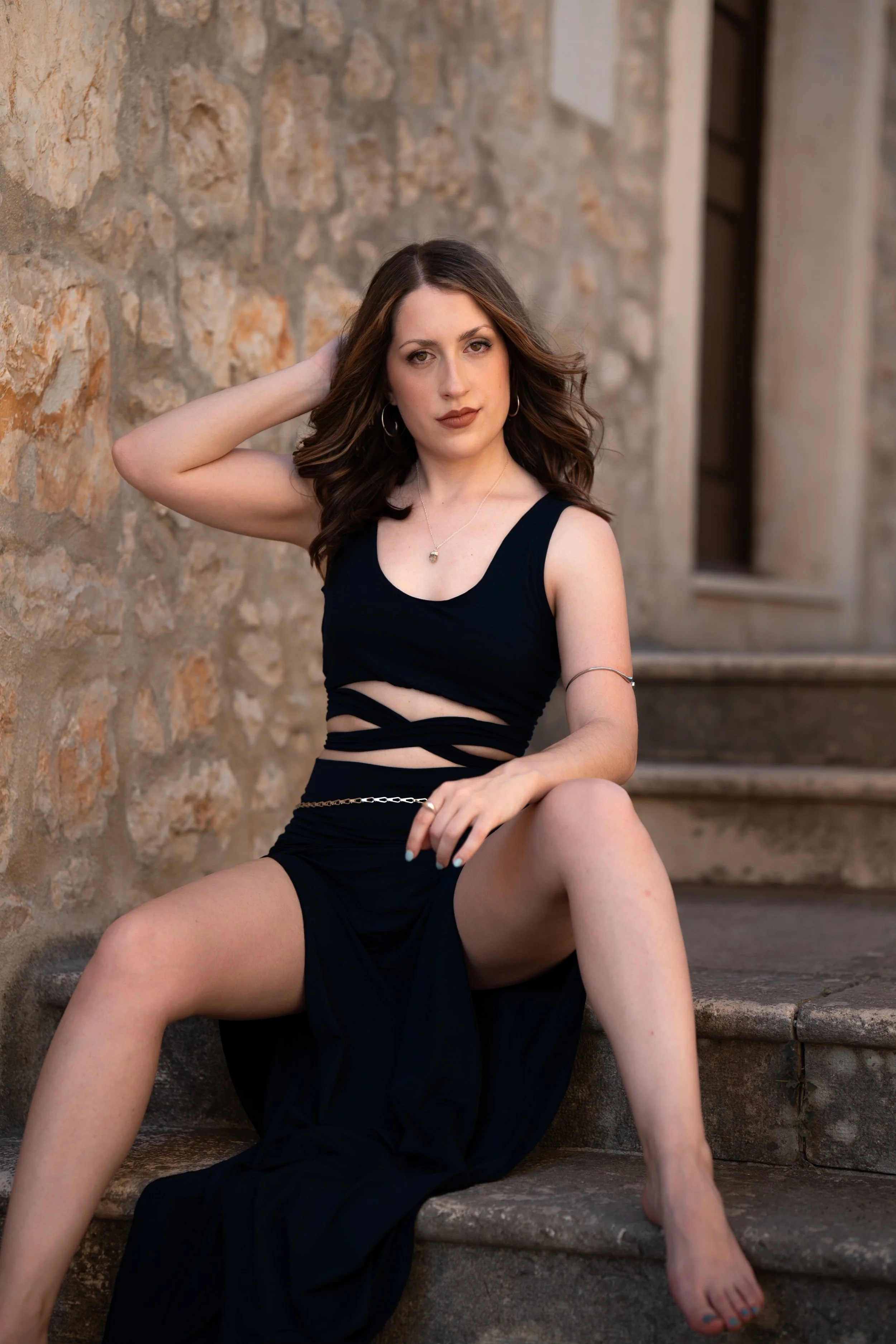 Marley sits on stone steps