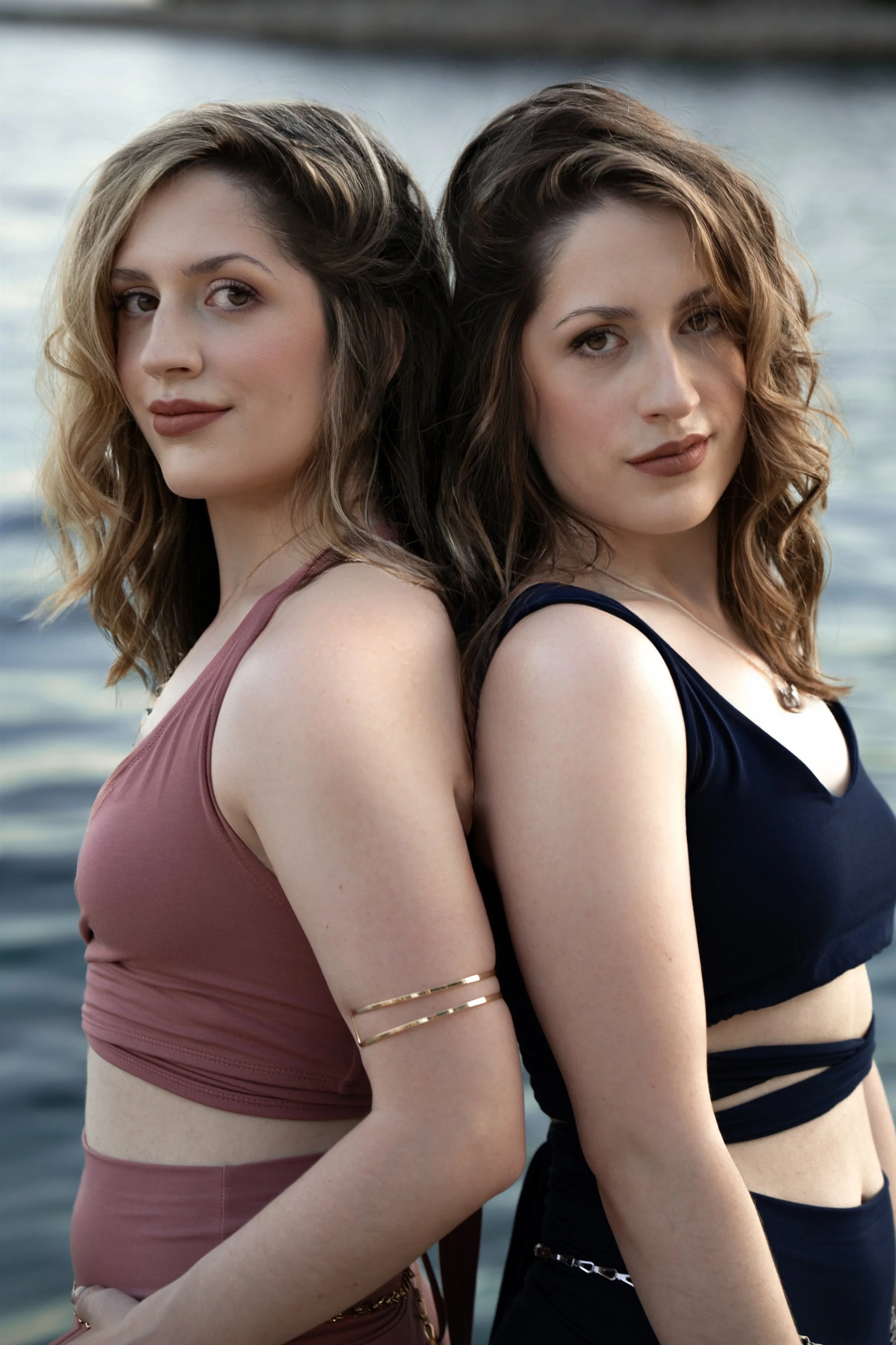Lacey and Marley stand back to back.
