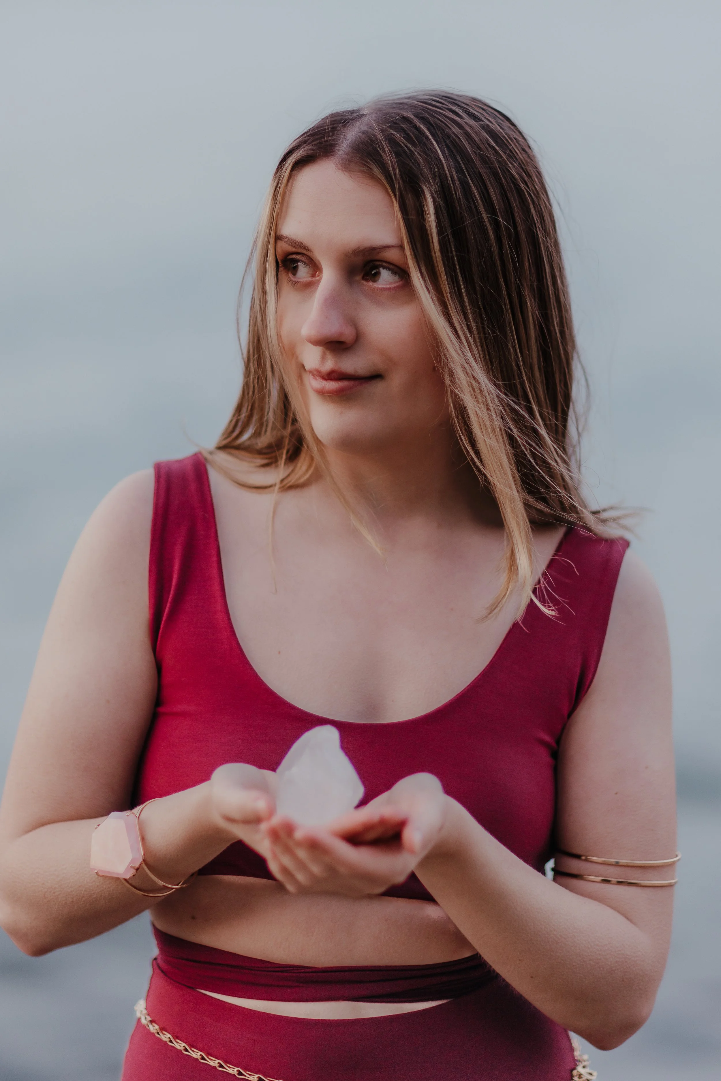 Lacey holding a crystal.