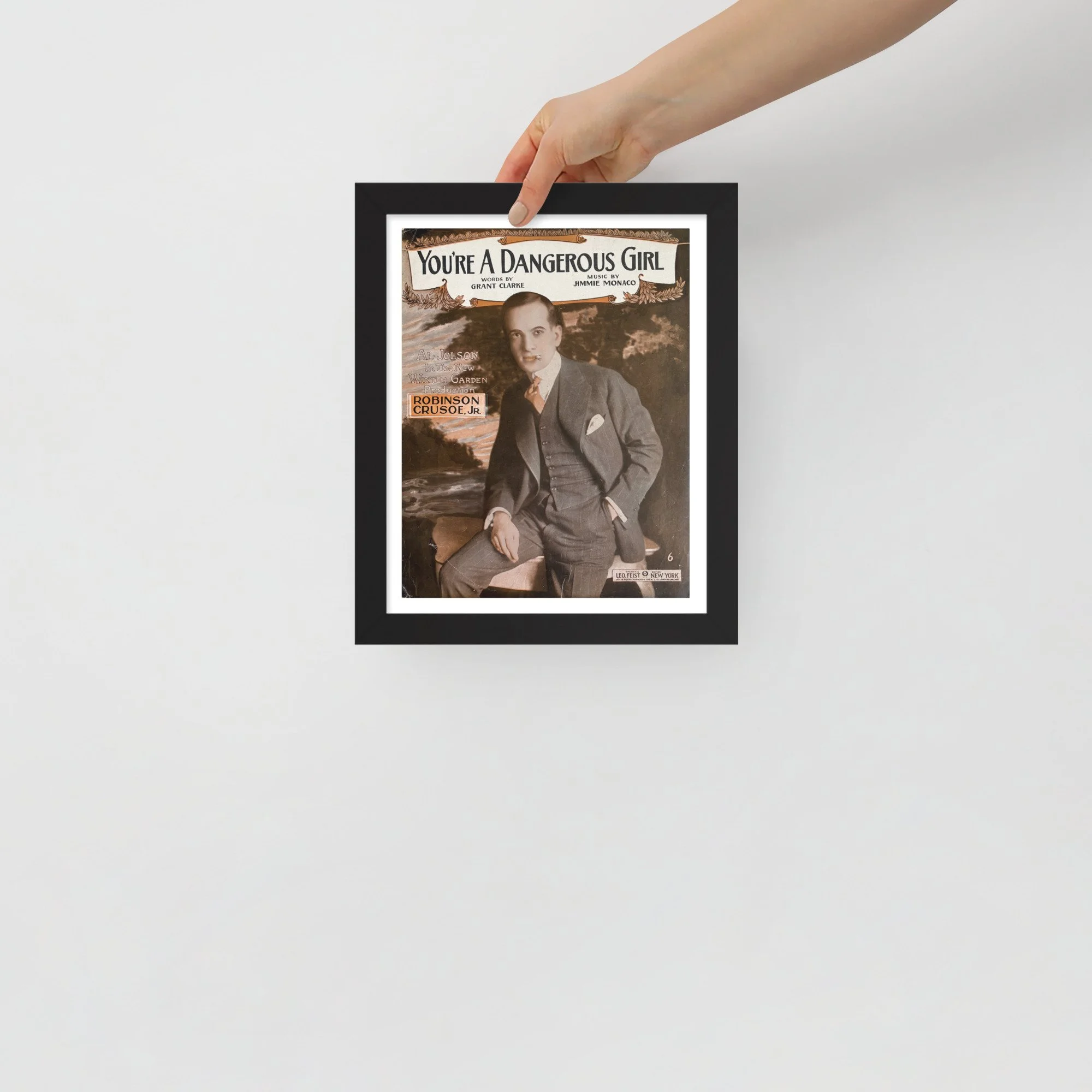 "You're a Dangerous Girl" poster featuring gray, sepia and peach tones.