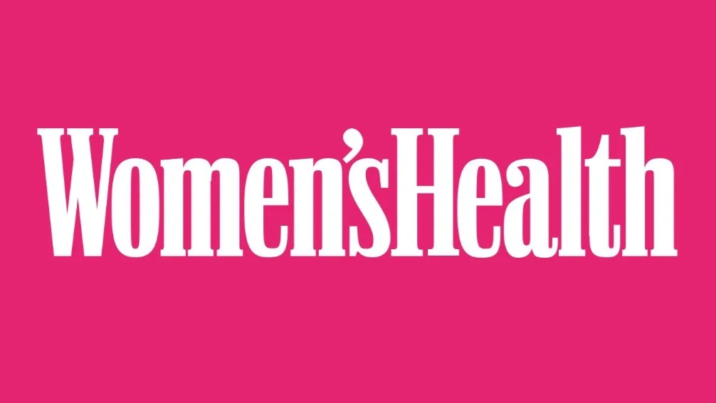 Pink background with white text that reads "Women’sHealth".