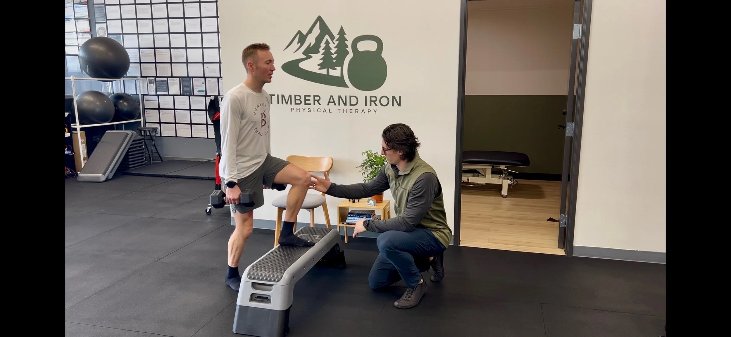 Dr. Ryan Eckert helping patient with knee control to help running form.