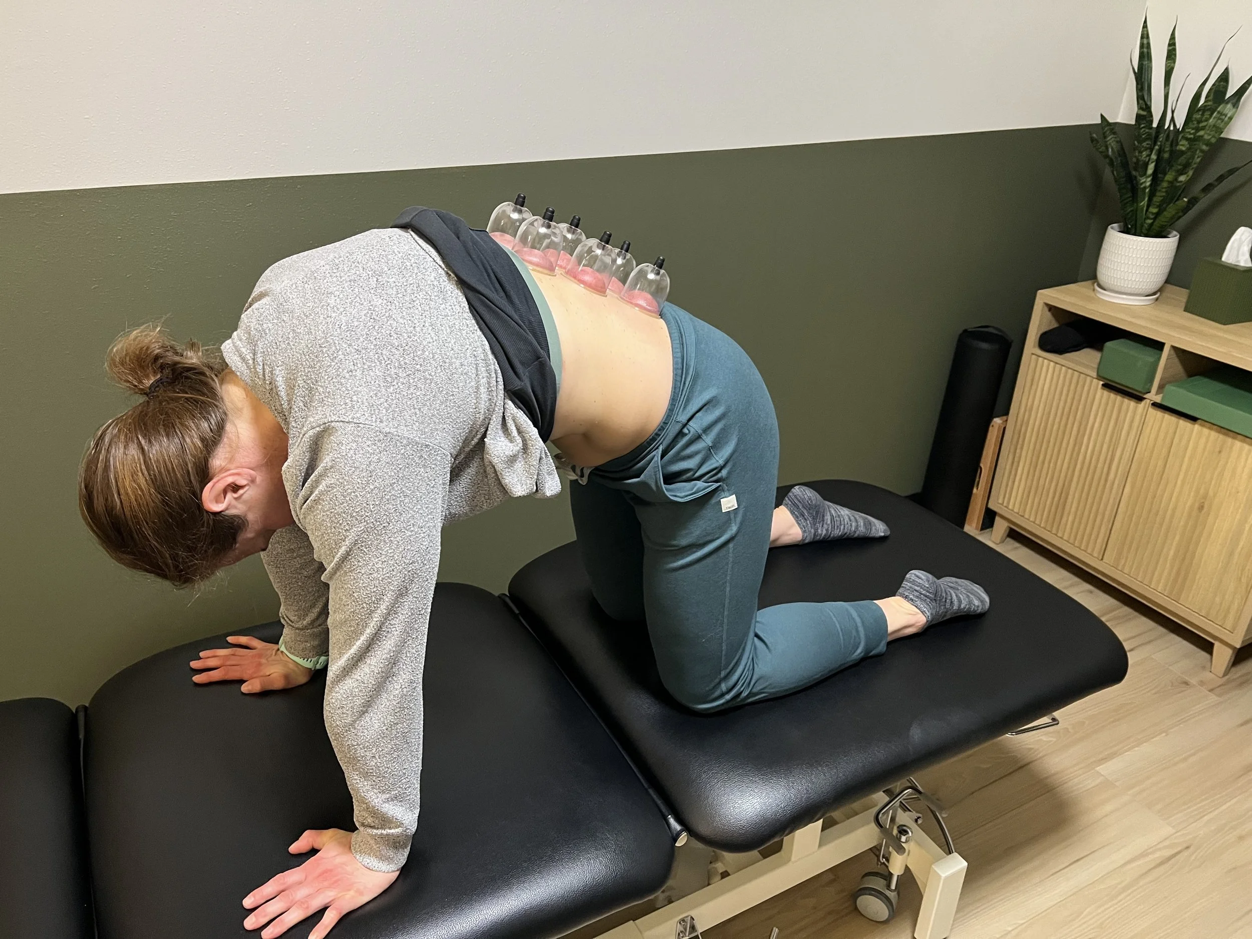 Soft Tissue Mobilization on the low back with cat/cow