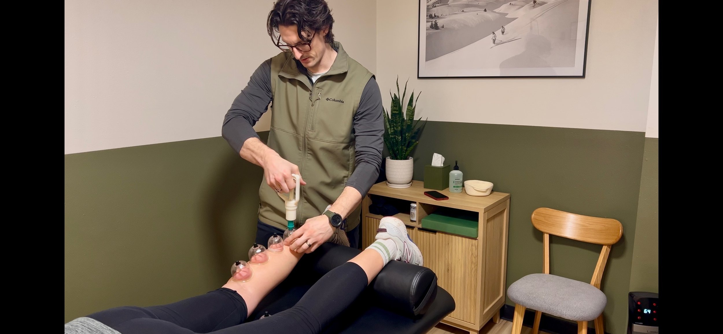 Dr. Ryan Eckert performing MFD Cupping for Foot and Ankle Pain