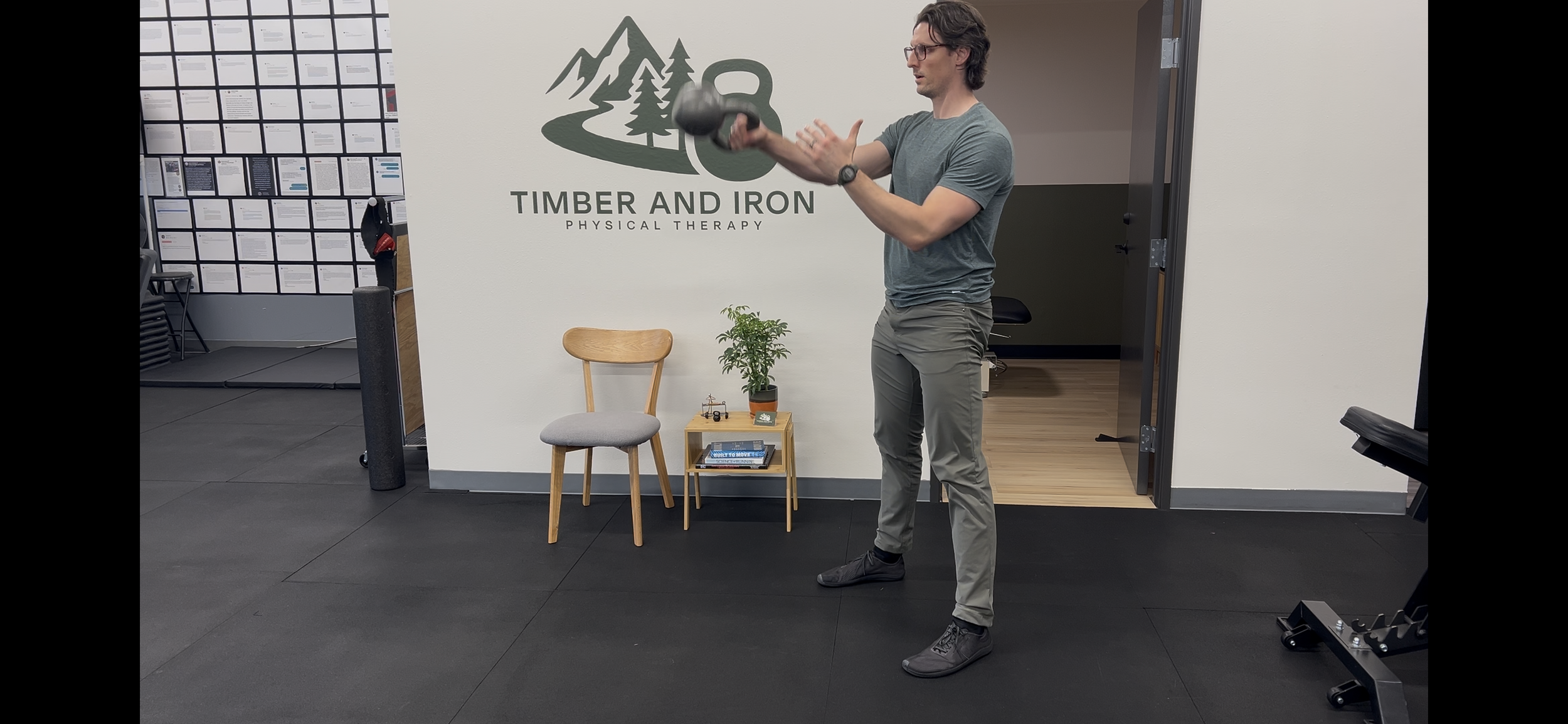 Dr. Ryan Eckert performing a single arm kettlebell swing.