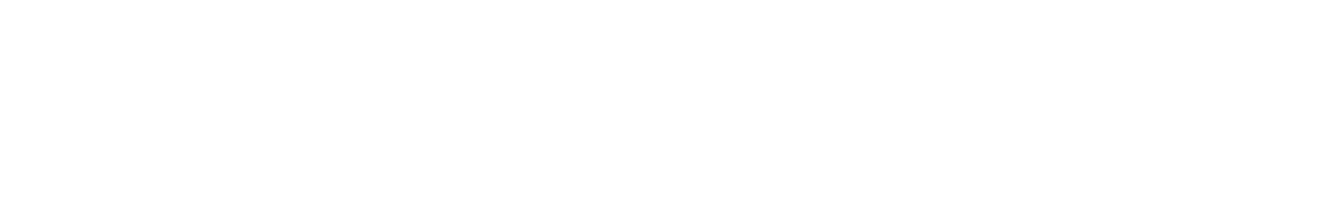 Close-up of a white signature on a black background.