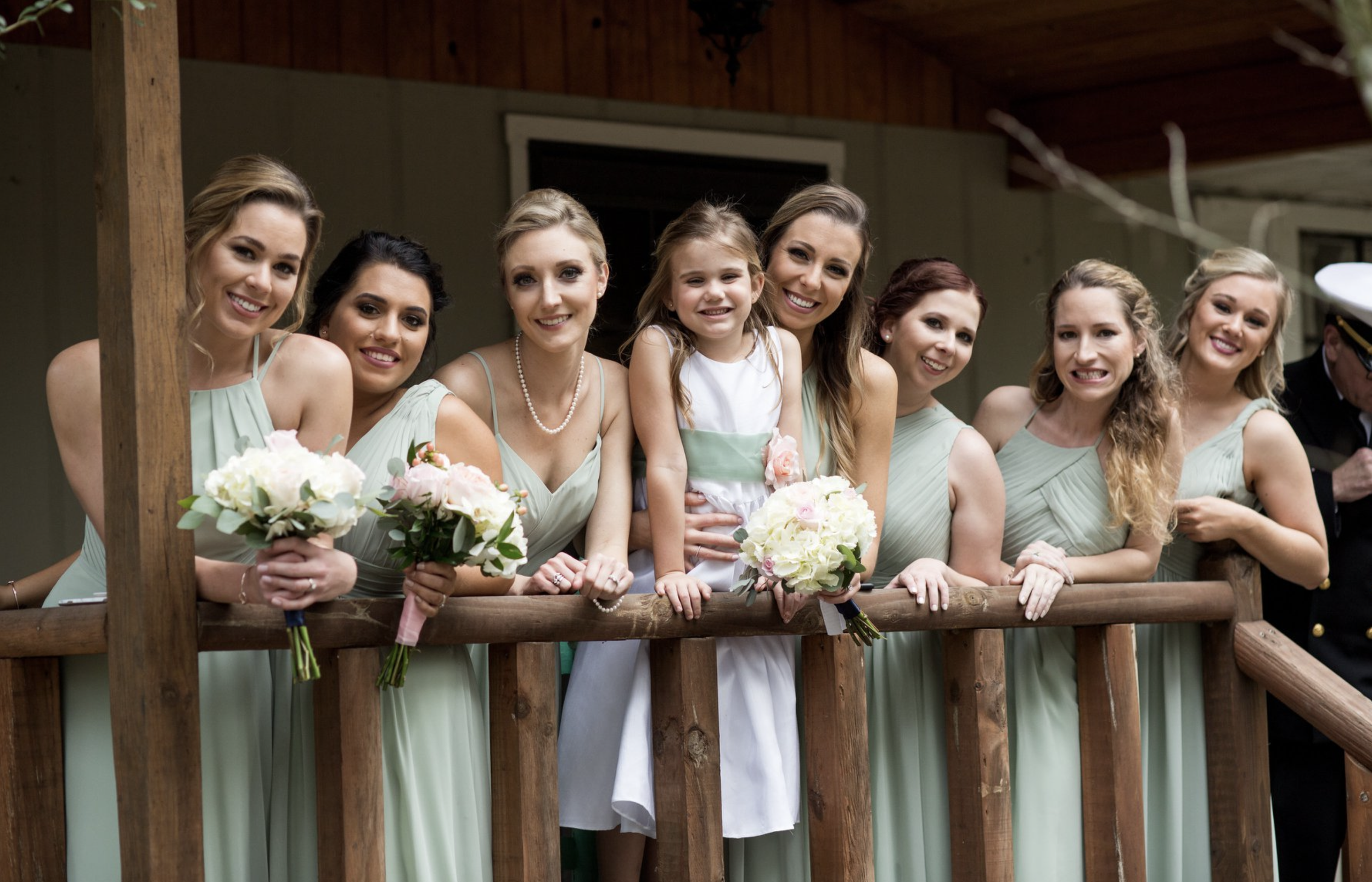 Bridesmaids in a sage green dress
