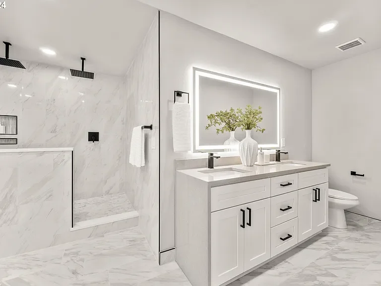 Modern bathroom with a walk-in shower, double vanity with a large mirror, and a toilet.