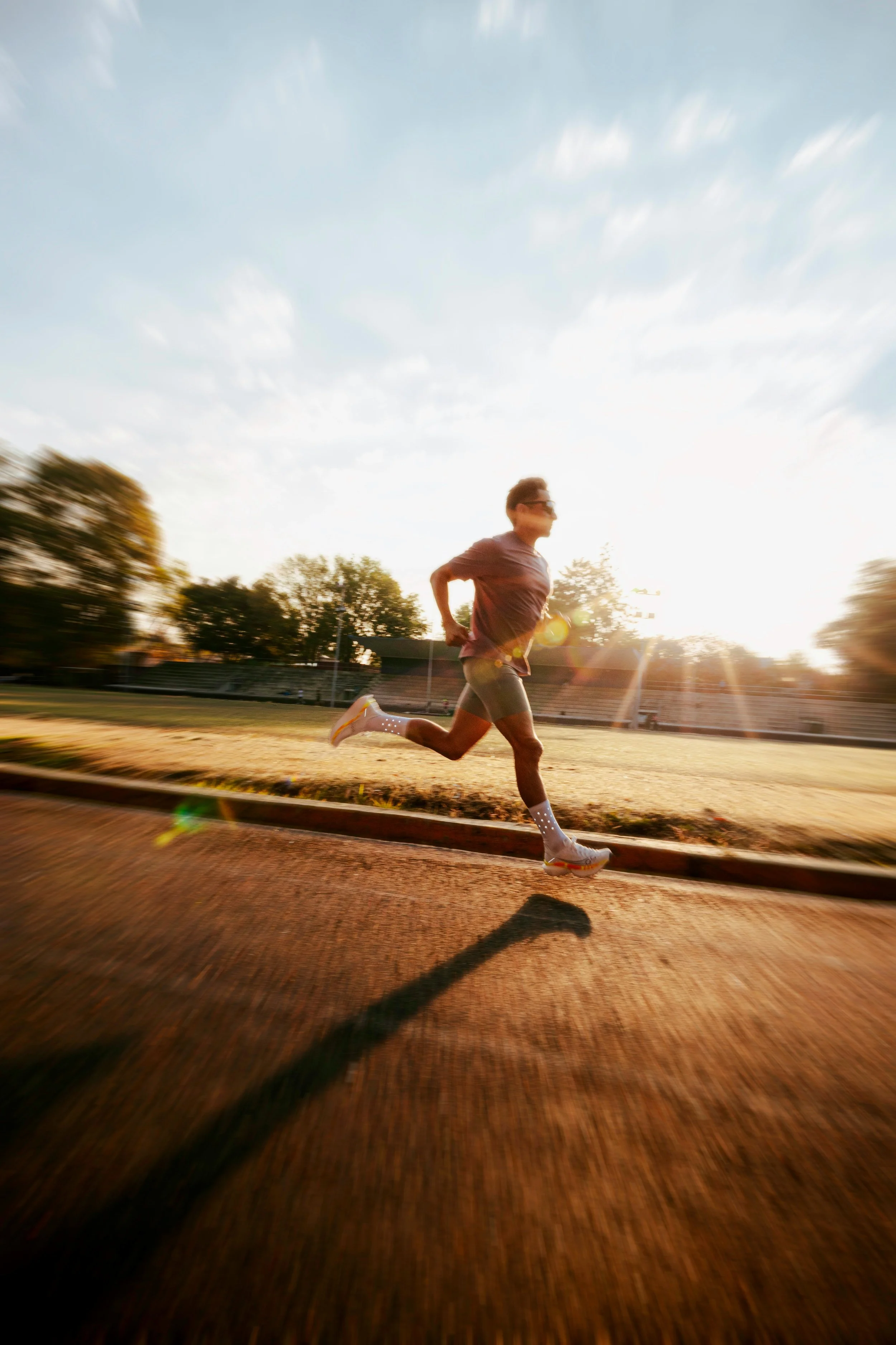 Athlete performing outdoor sprint training as part of a warm-up routine