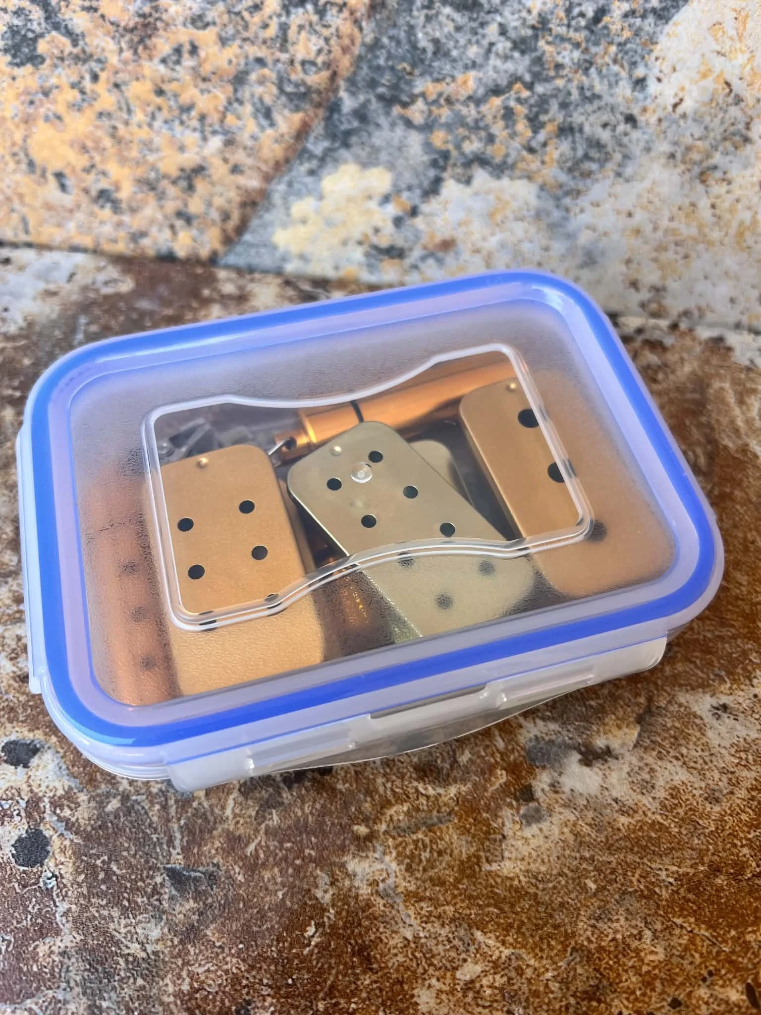 Compact dog scent work and nose work training kit with gold scent containers, hide vessels and latch-top storage box