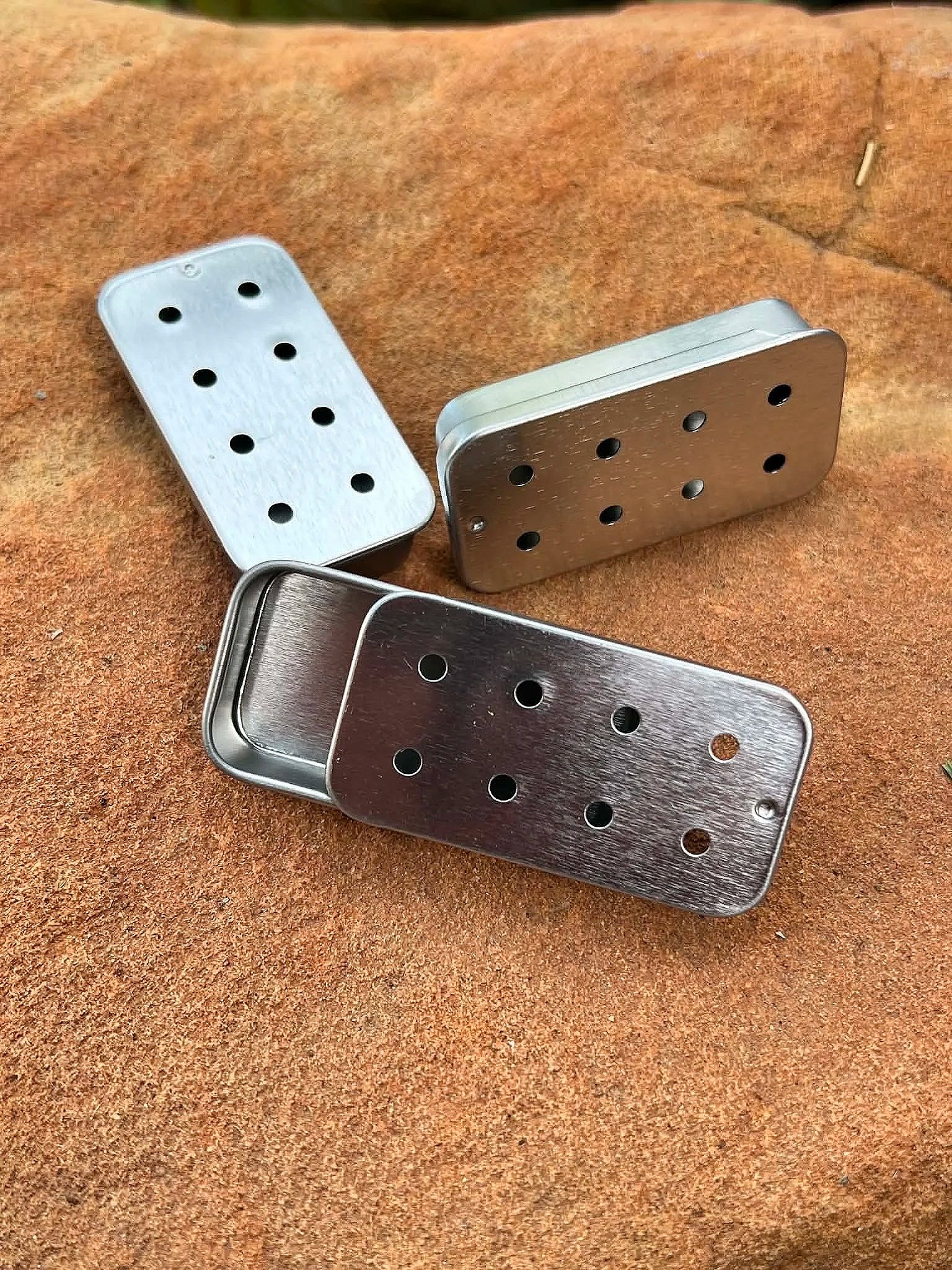 Eight hole slider tins in gold used in K9 Nose Work and AKC Scent Work.