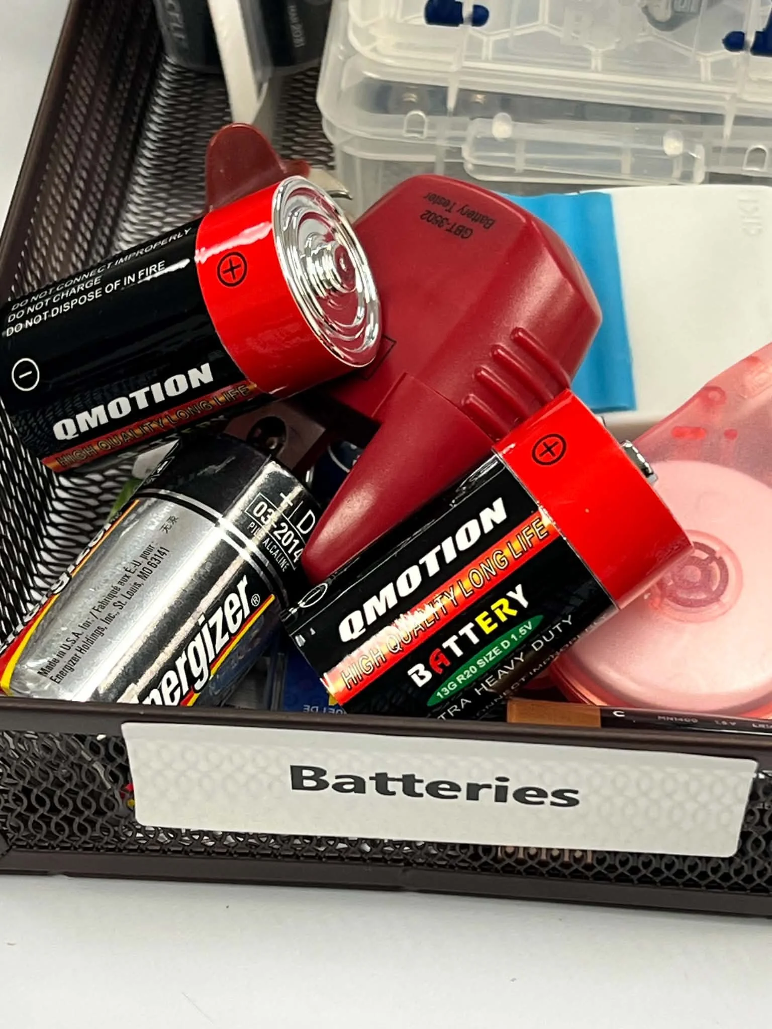 Realistic battery hide vessel blended into everyday supplies for advanced scent work and nose work training scenarios.