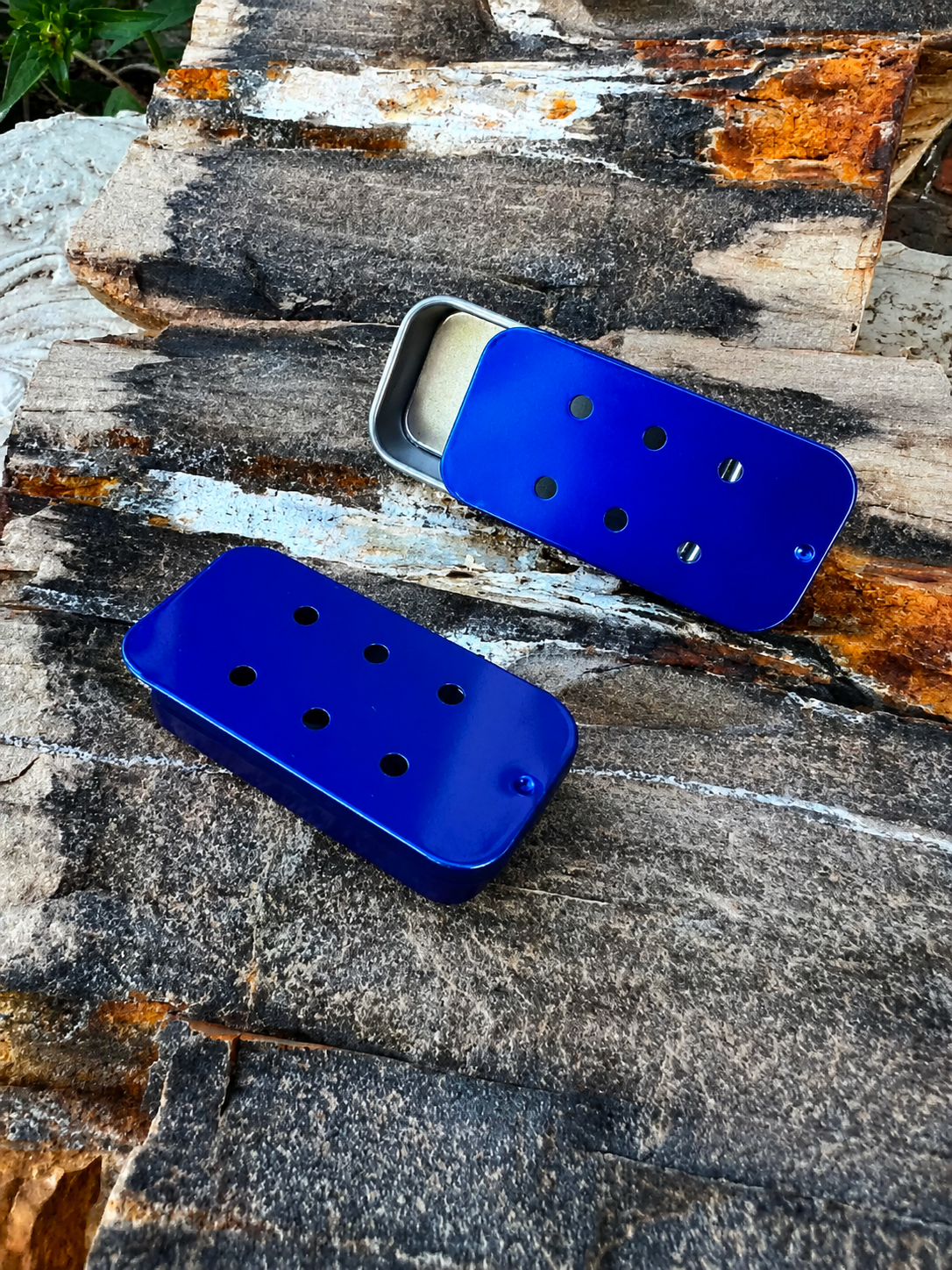 Blue Six Hole Slider Tin.png