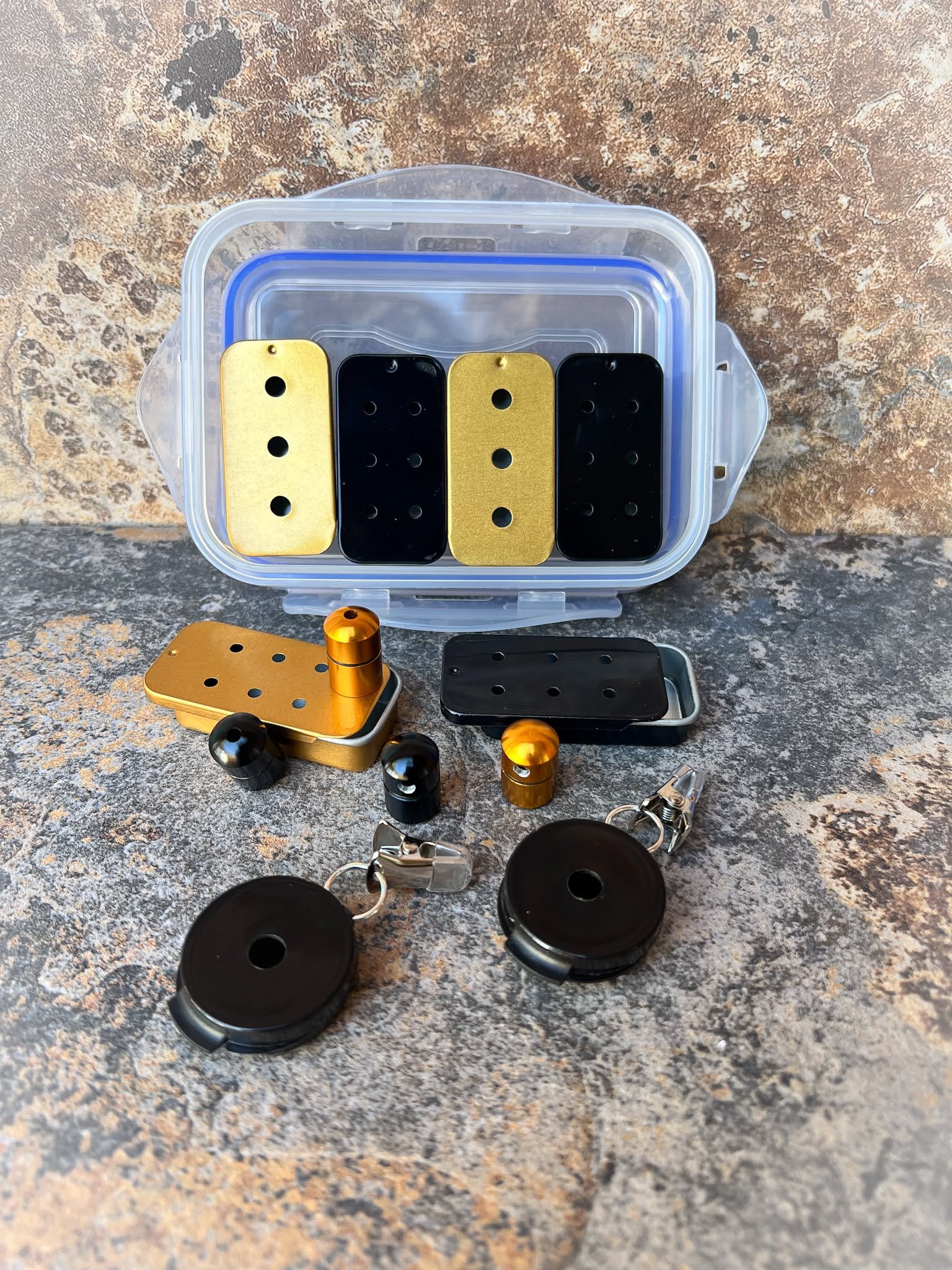 Compact Black & Gold scent work training kit featuring multiple hide vessels for nose work searches.
