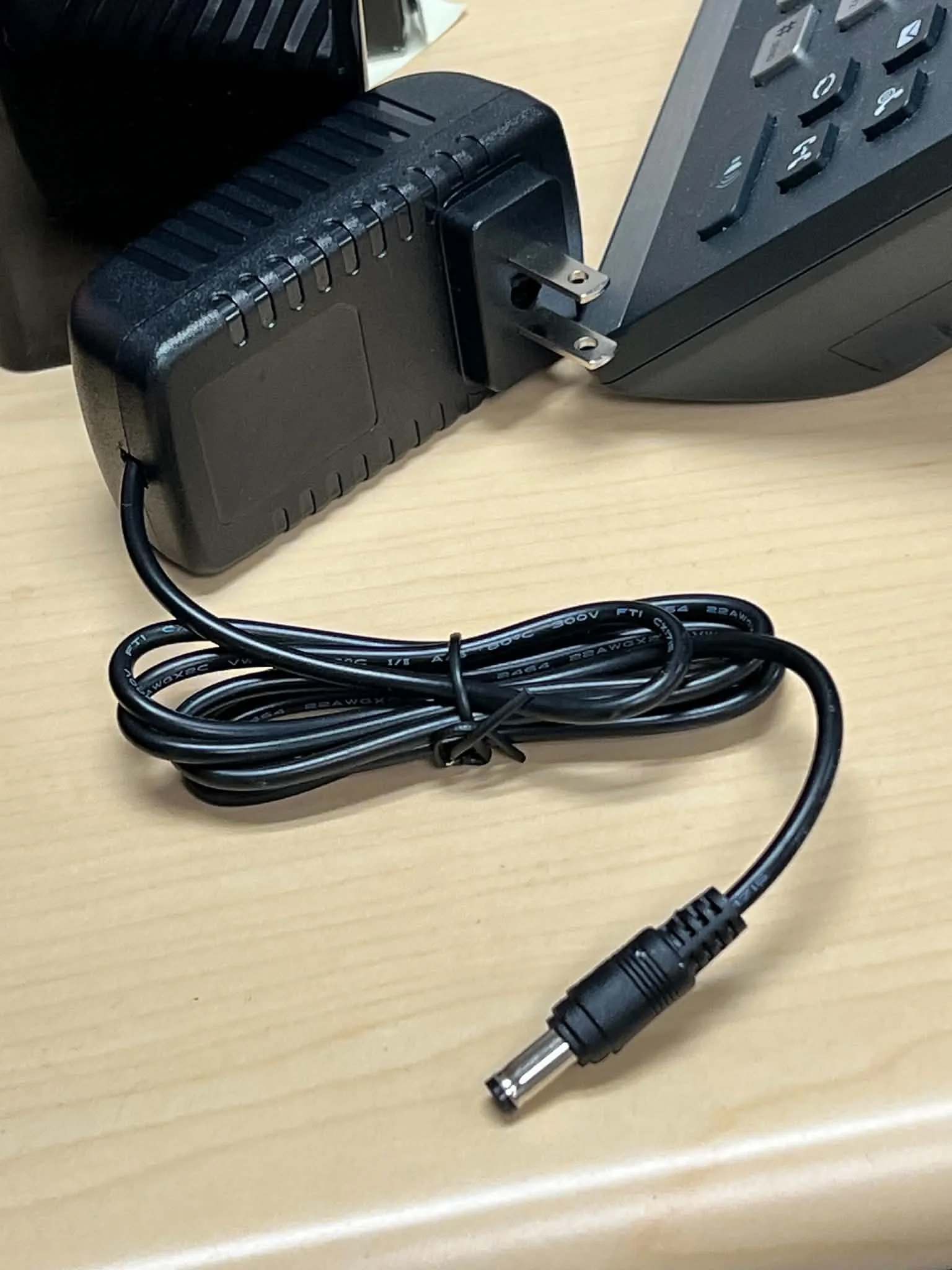 Charging Unit Hide showing odor hole between the charging prongs