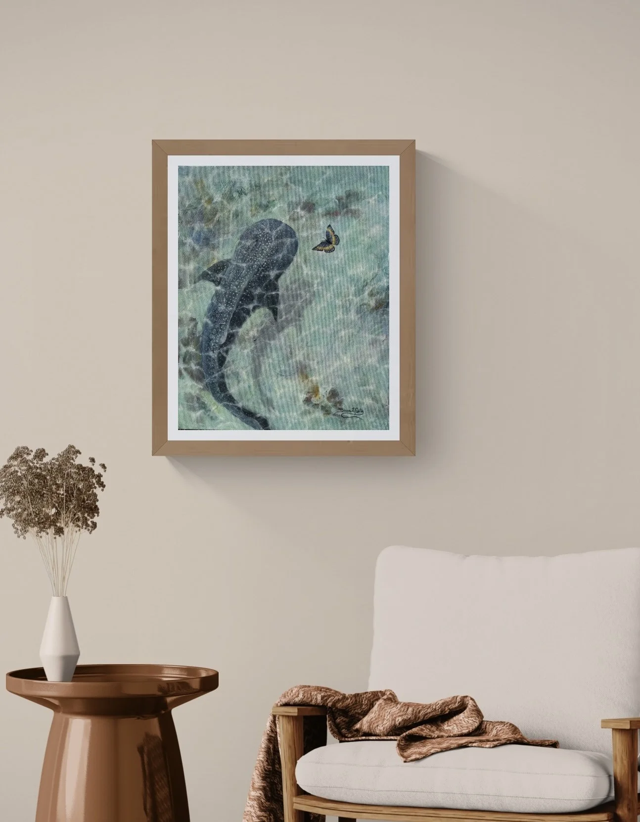 Living area with a rocking chair and side table.jpeg