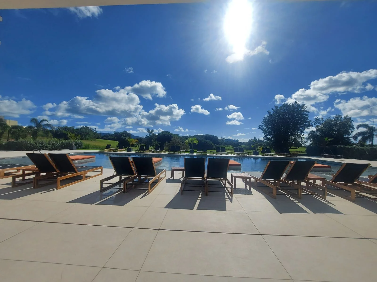 Pool overlooking the golf course where you can see the sunrising from the pool too.