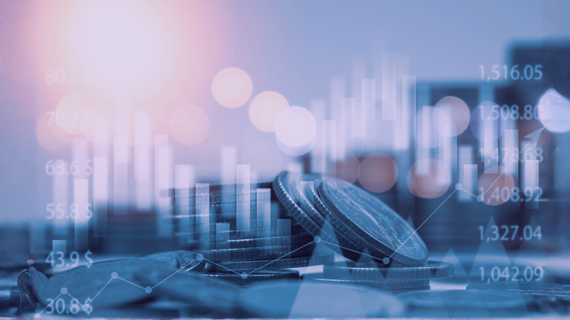 Stacked coins with digital financial data and charts overlaid, illustrating financial growth or analysis.