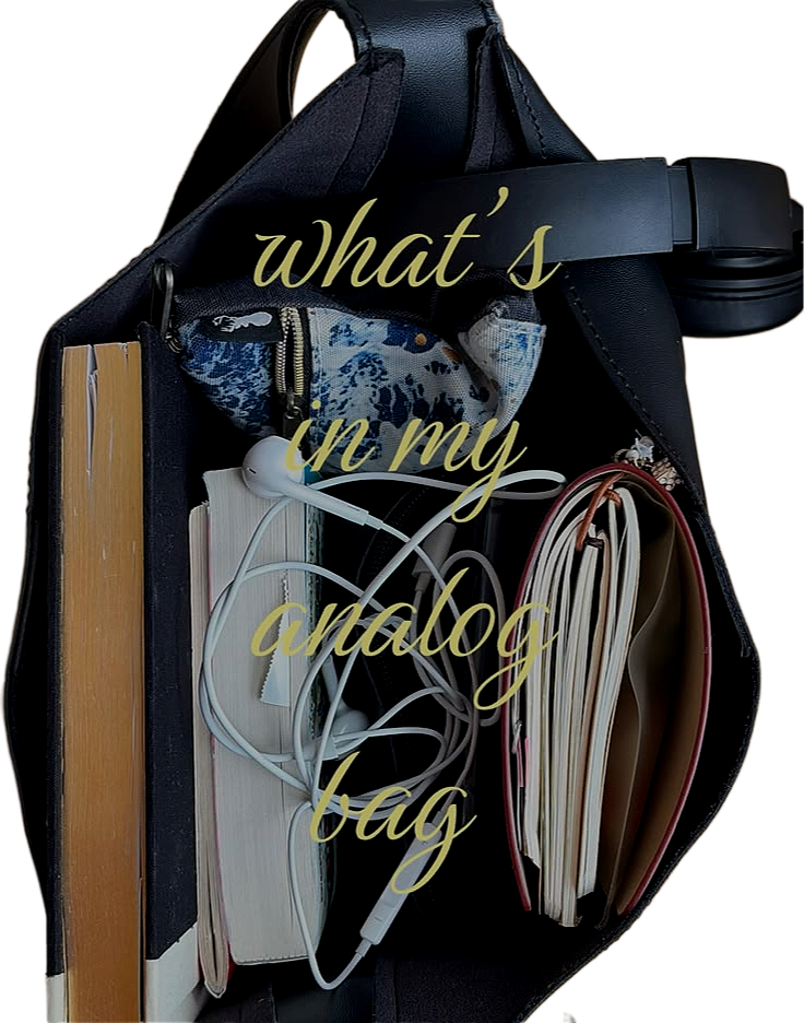 Open black backpack containing books, earphones, a pouch, and notebooks with the overlay text "what's in my analog bag".