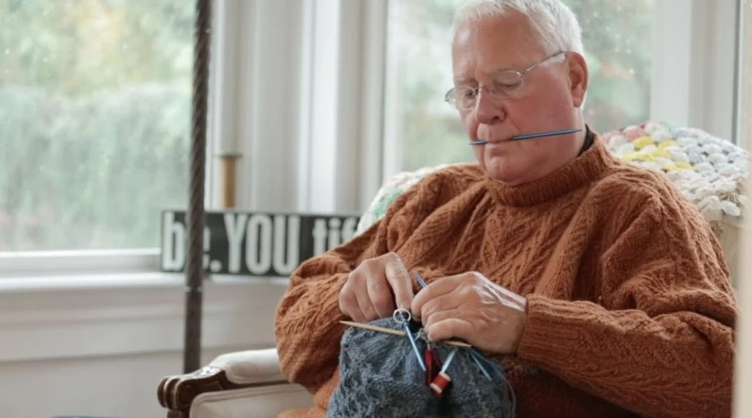 Older gentleman doing crochet