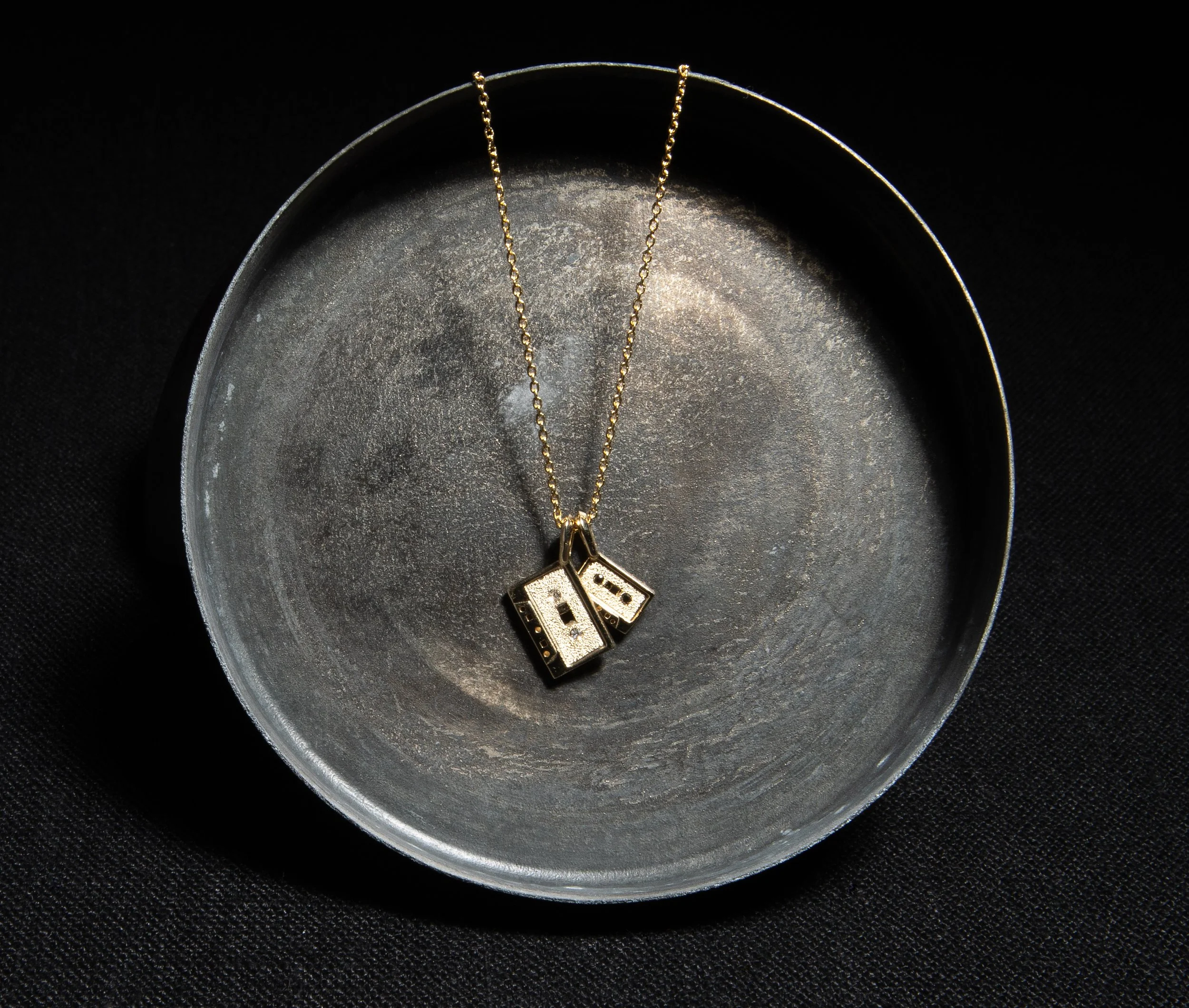 kima mix tape on chain.jpg