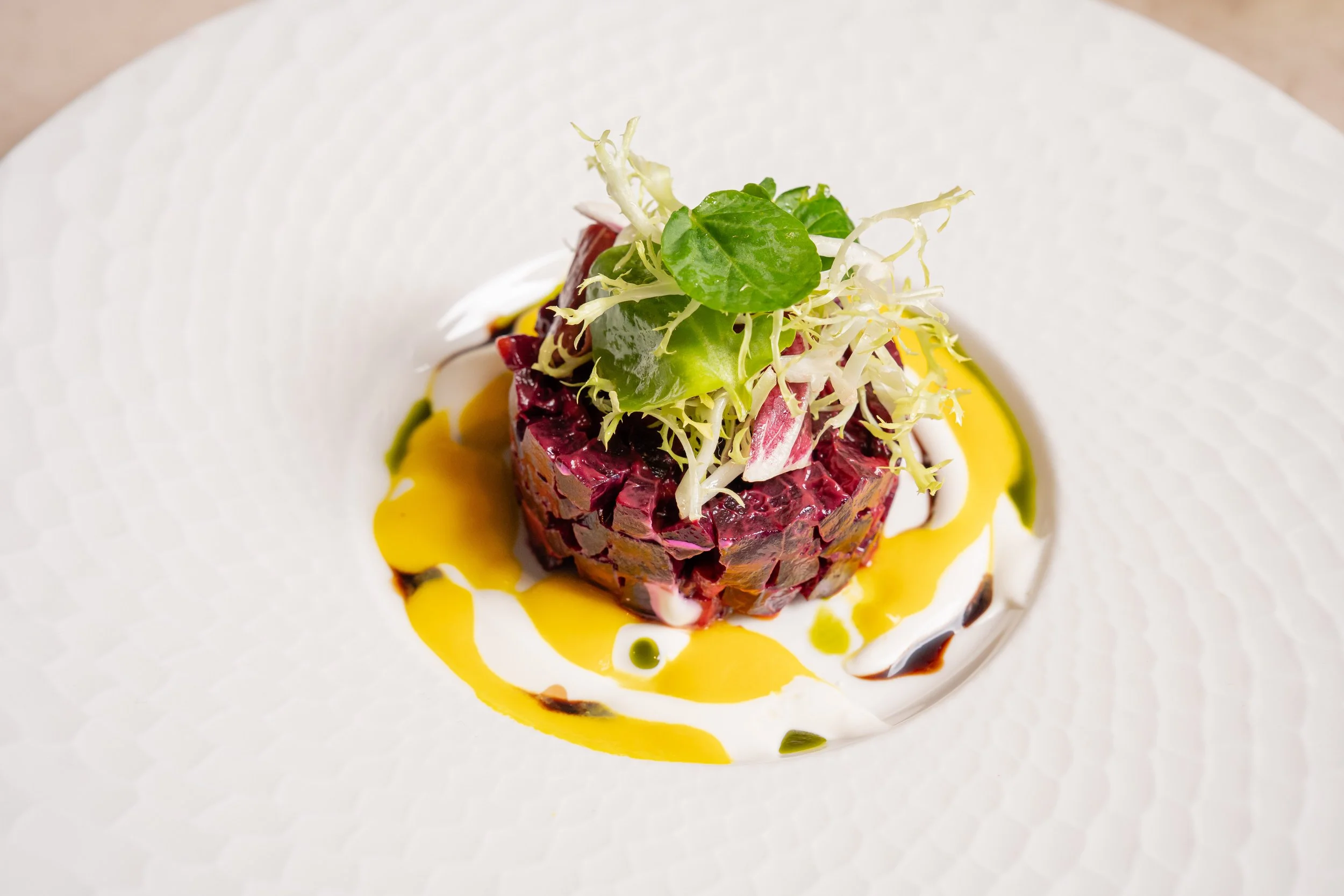 beet dish with microgreens