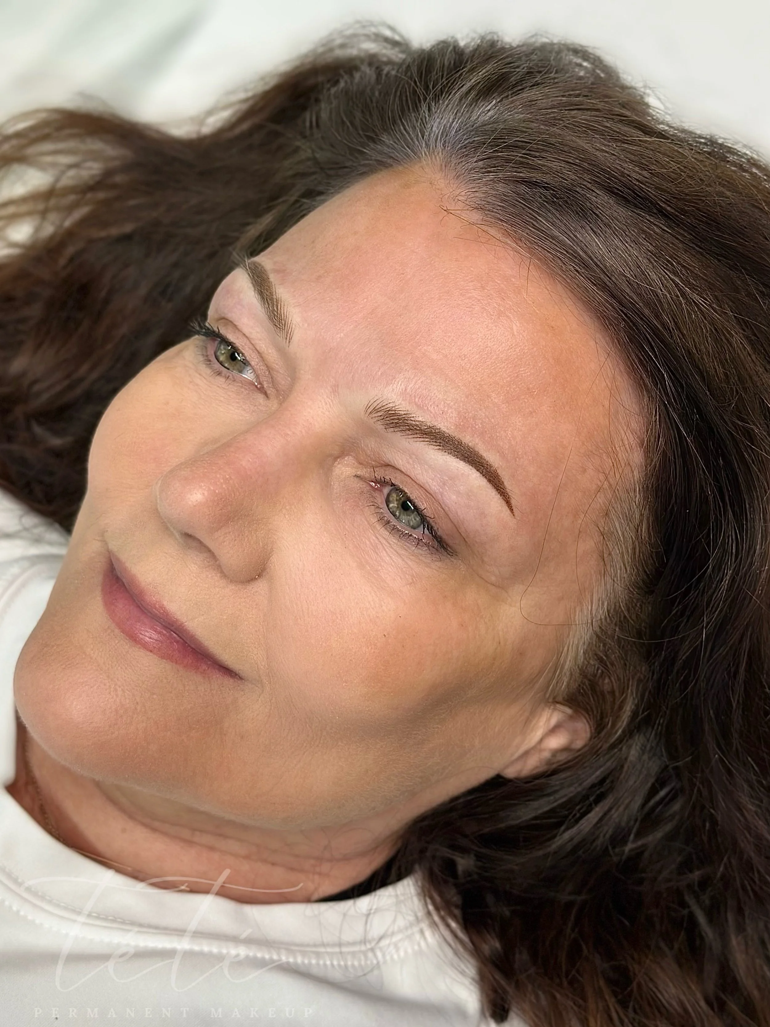 Swipe to see her healed 😍 She was tired of filling in her brows every single day &mdash; so we fixed that 🤍 She was missing most of her tail and combo brows gave her the fullness she&rsquo;d been missing. She healed beautifully and her touch up was