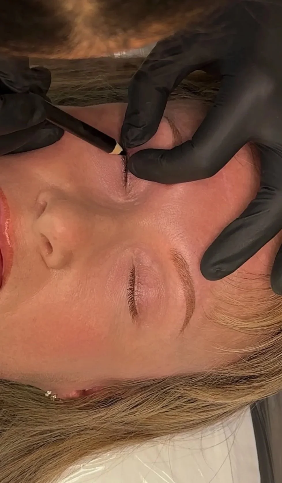 Lash Line tattoo procedure performed at TéTé in Conway, SC, using a tattoo machine