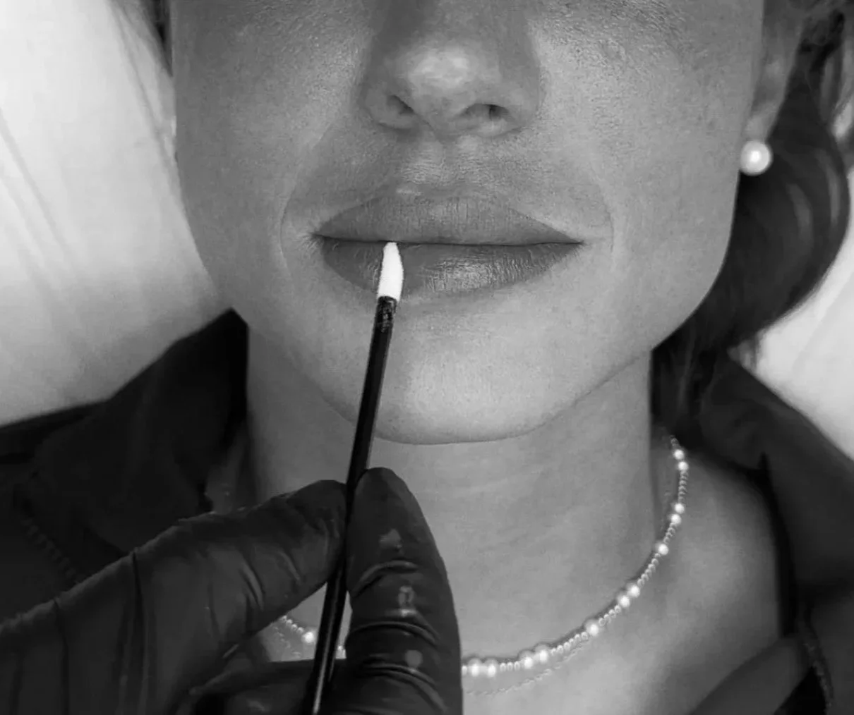 Lip Blushing procedure at TéTé in Conway, SC, with pigment being applied to the lips.