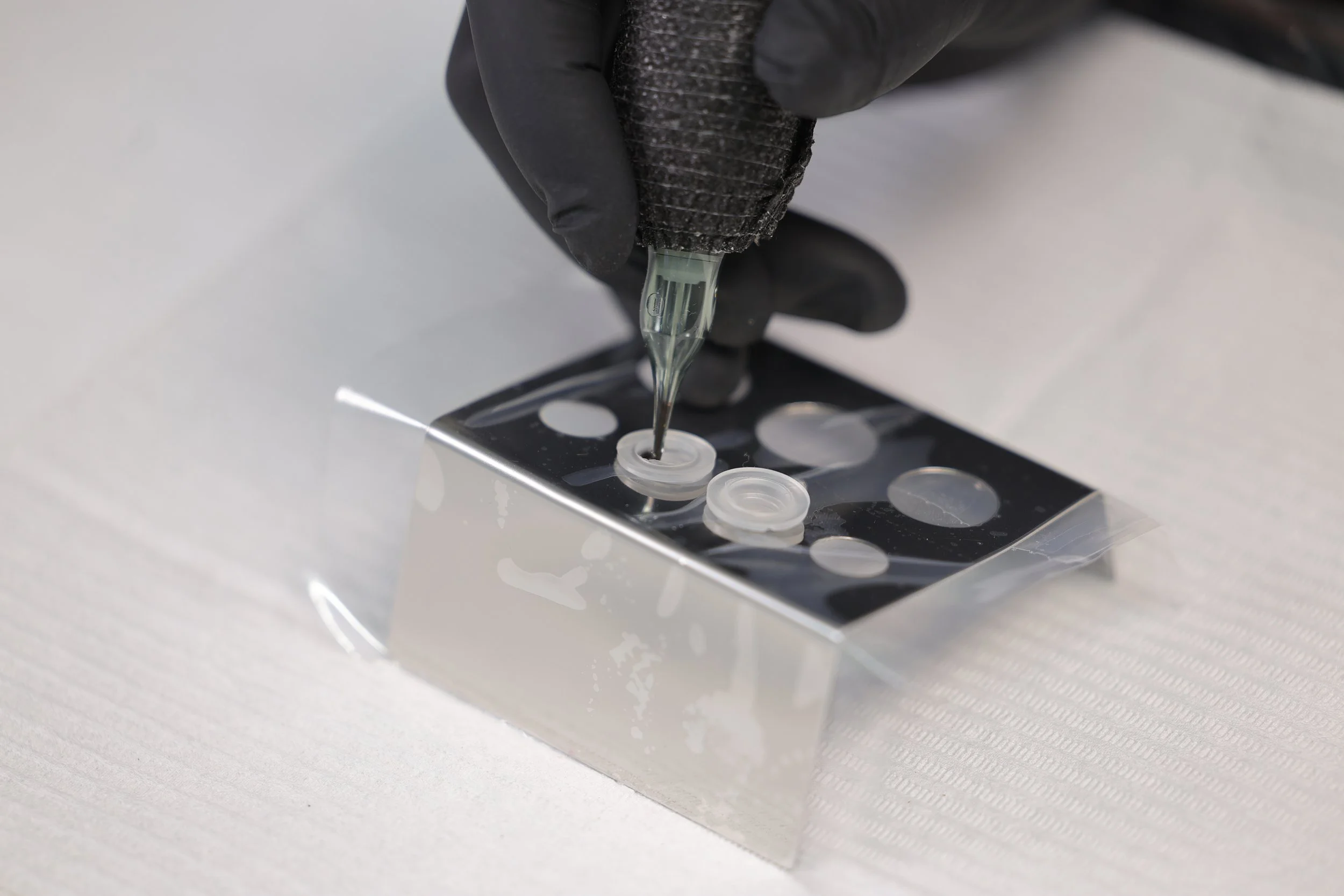 Permanent makeup pigment preparation for brows, lips, and lash line services at TéTé.