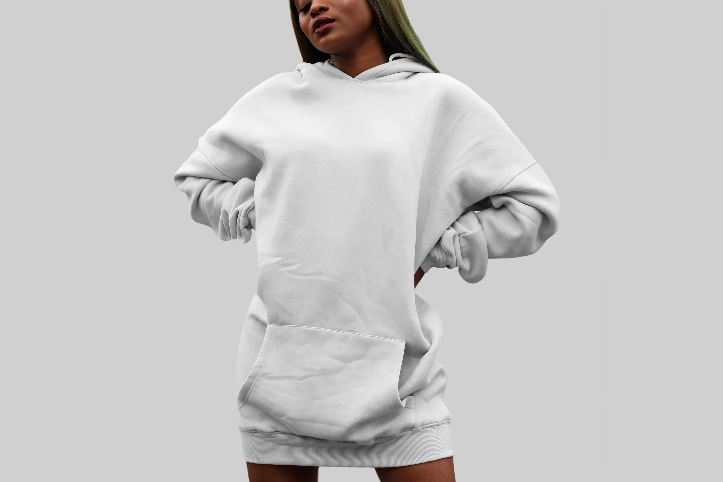 Young Woman on Big Heavy Hoodie Mockup copy.jpg