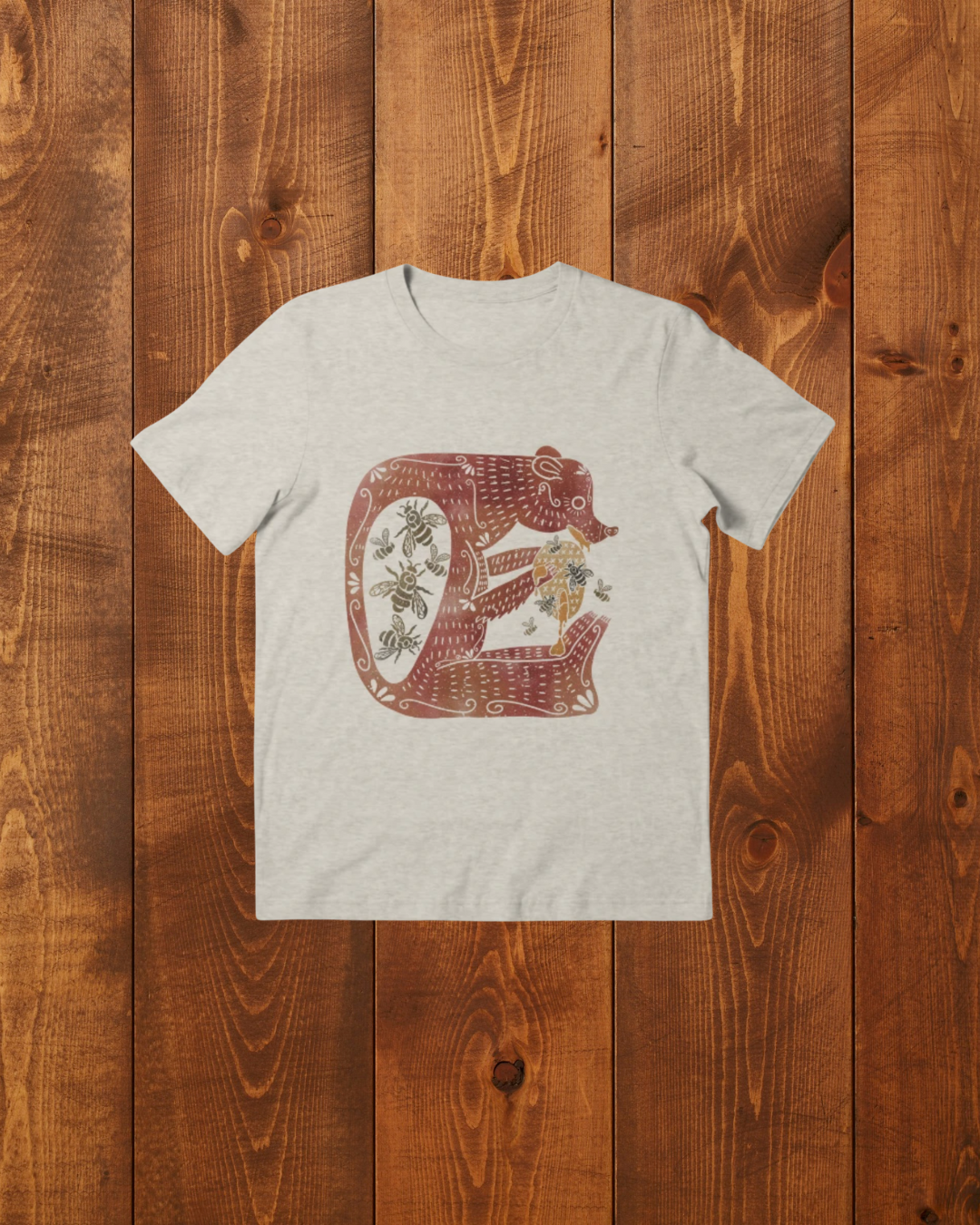 Digitally drawn art of a red bear with bee's in its belly holding a beehive dripping with honey with bees flying around the hive