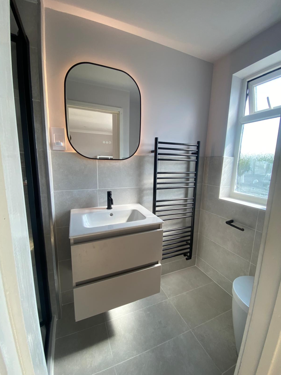 Modern bathroom with black fittings and fixtures