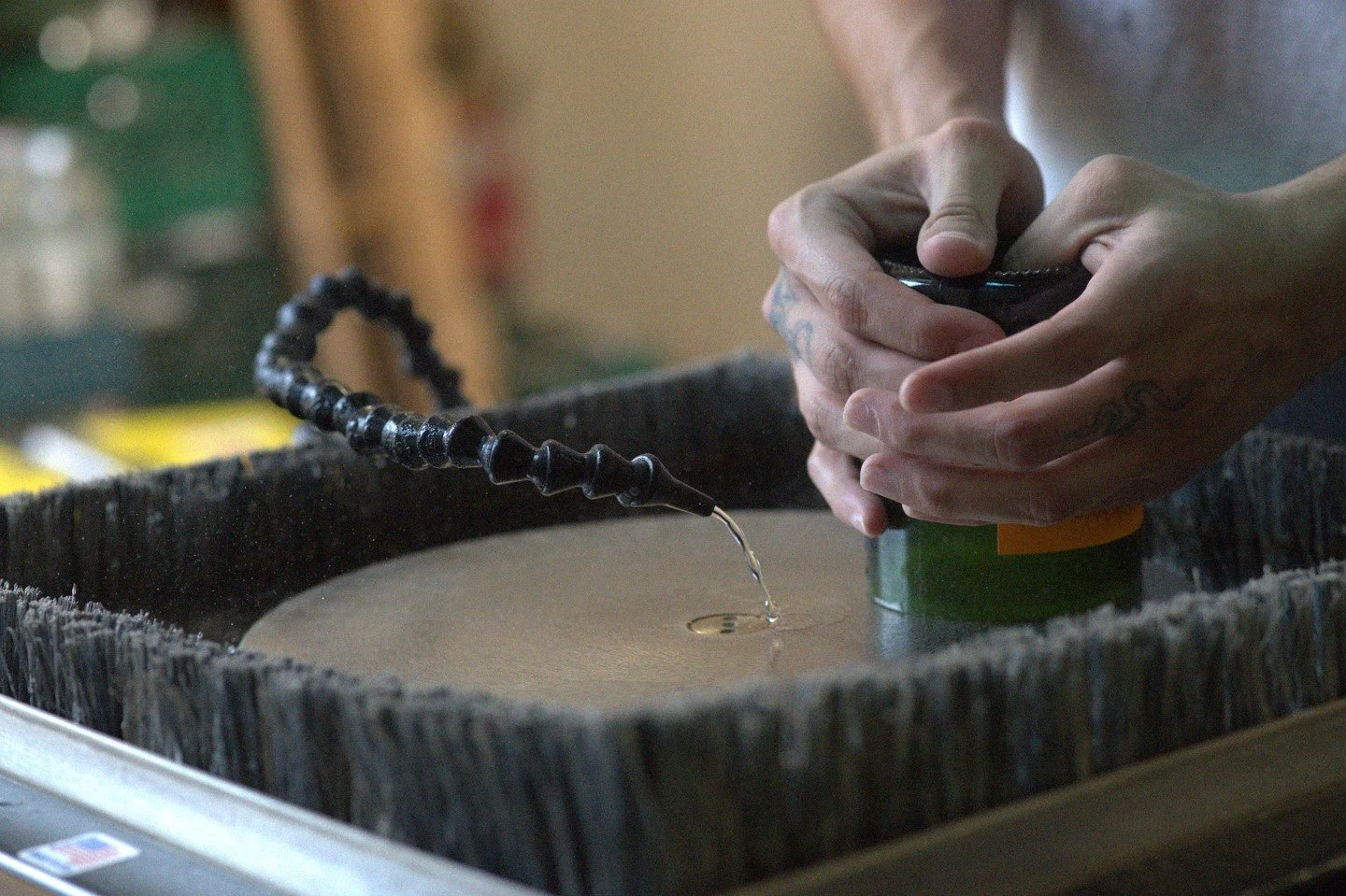 smooth it out ✨ this is just one part of our process to transform our bottles into upcycled candles!