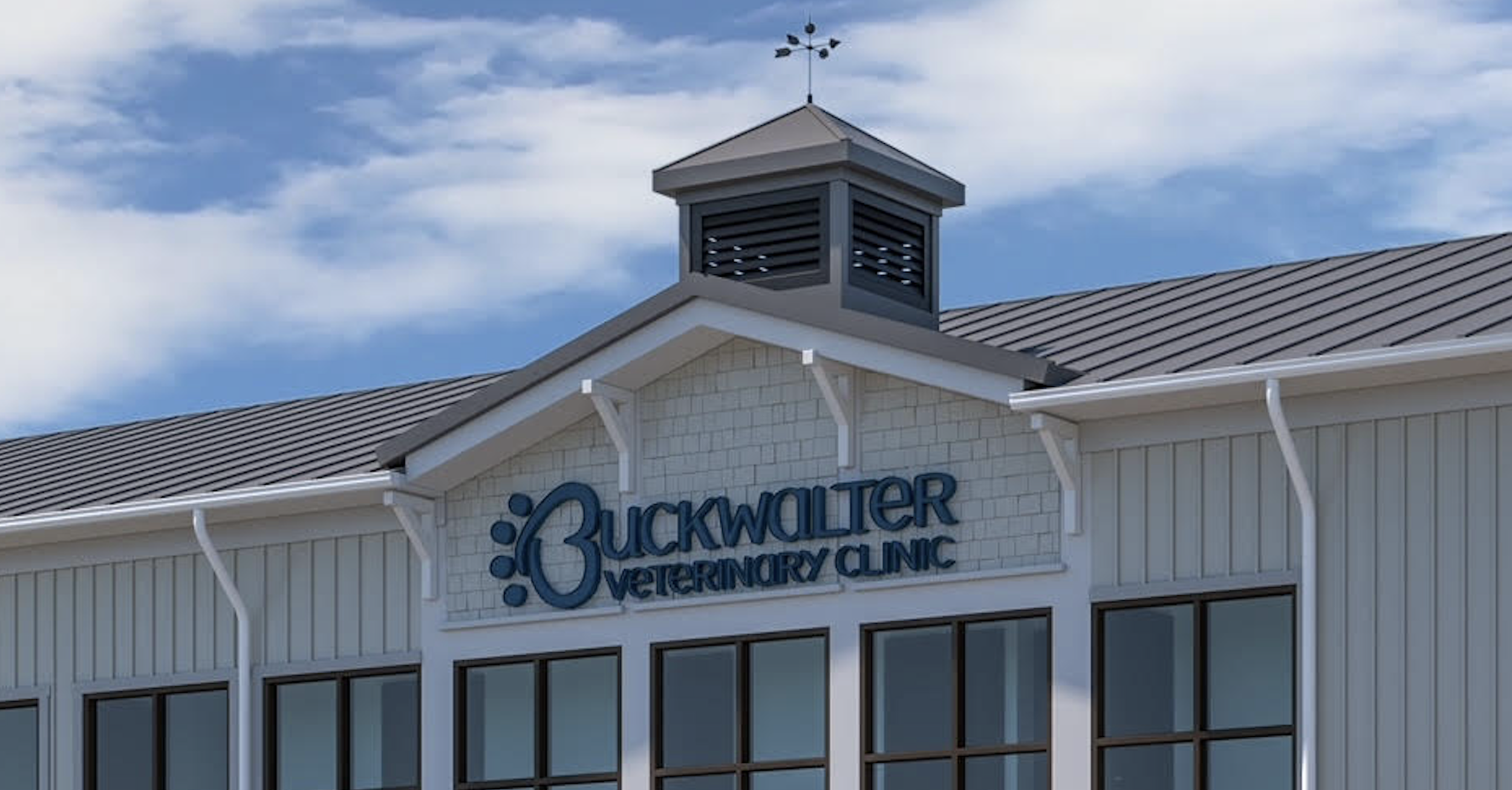 Exterior view of Buckwalter Veterinary Clinic building with large windows and a sign, under a partly cloudy sky in "PAWS Center" in Bluffton SC in the lowcountry of South Carolina