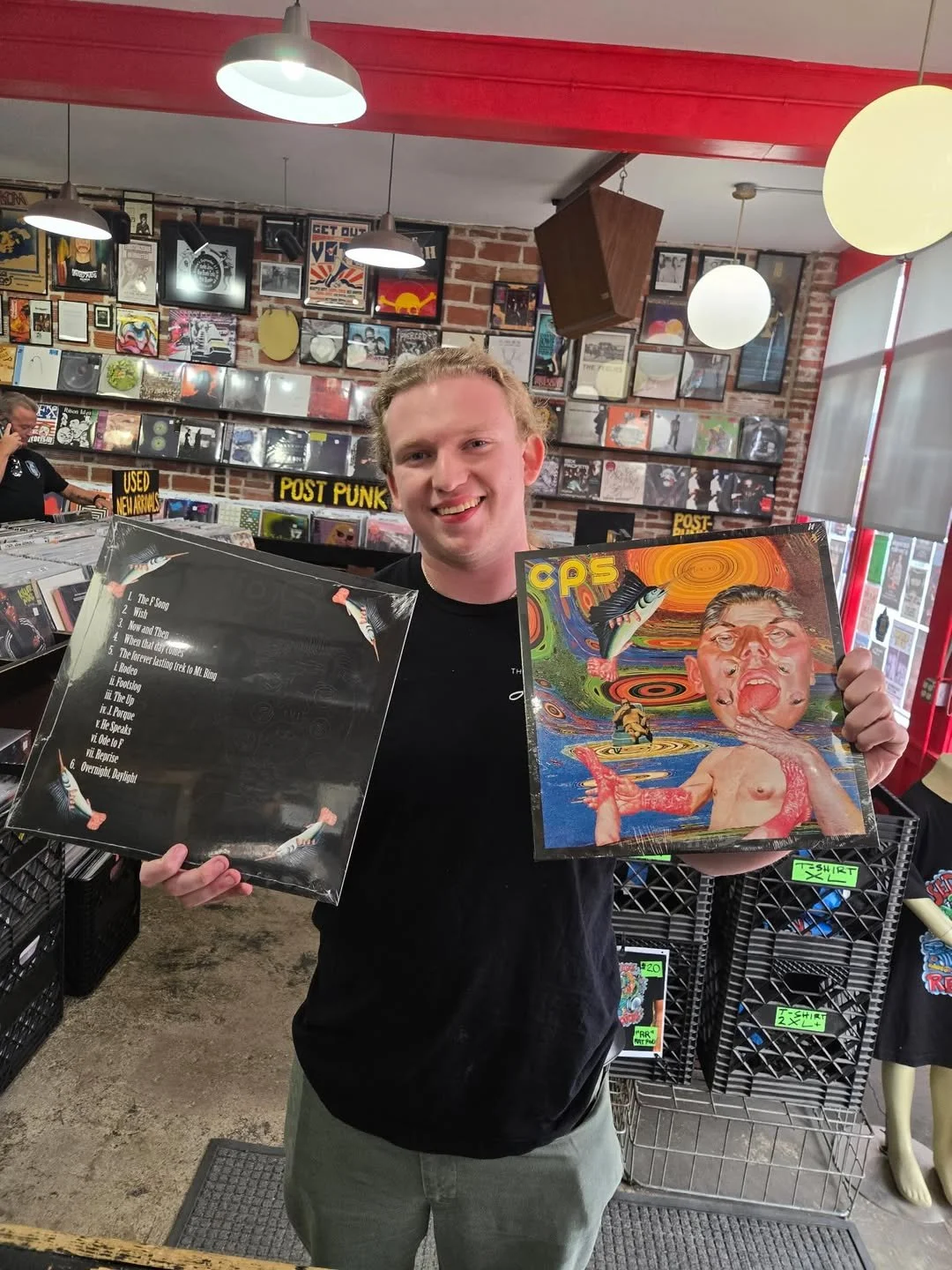CPS Ant holding album.jpg