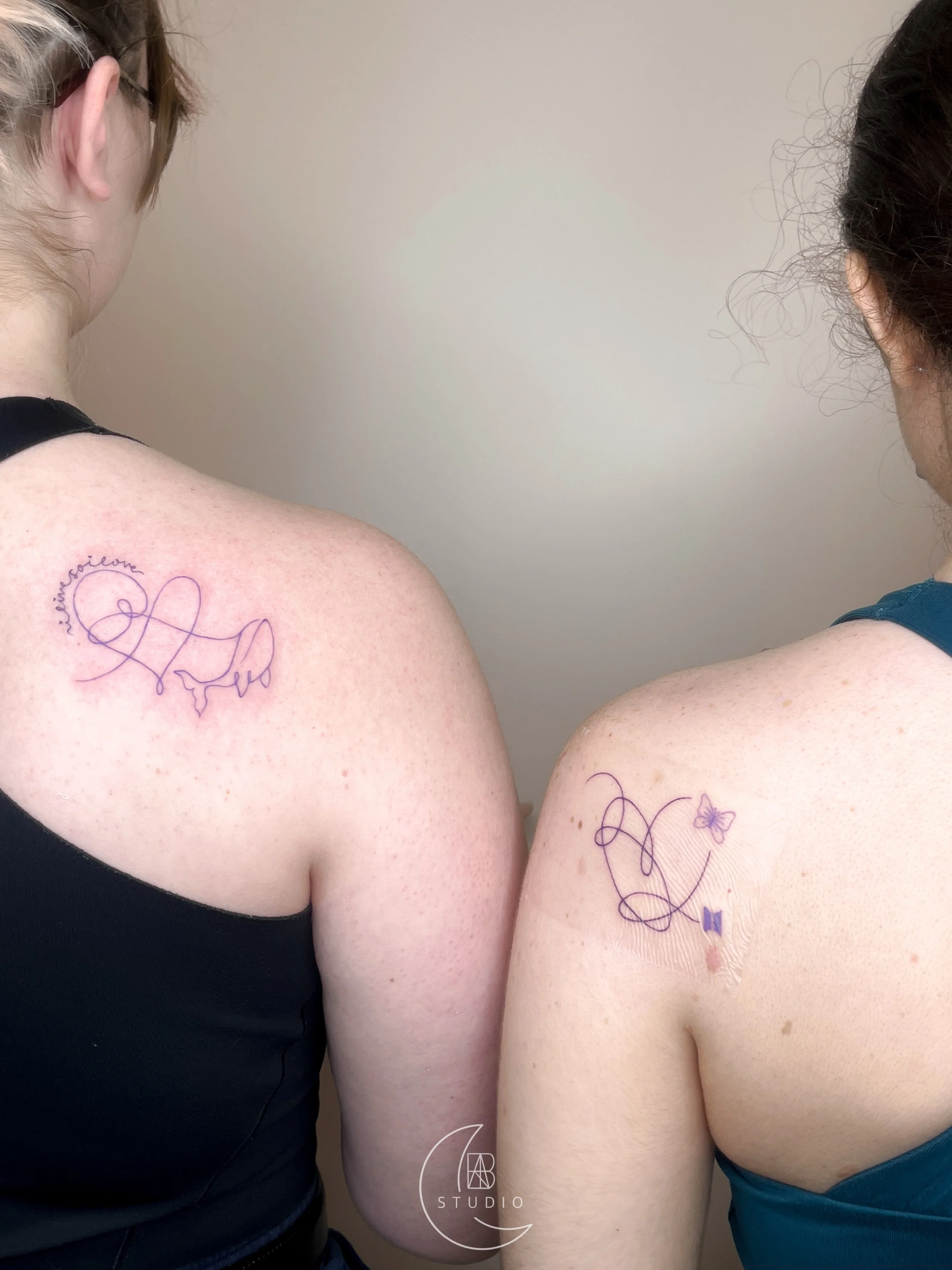 matching concept tattoos of purple linework hearts from BTS Love Yourself concepts